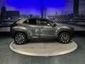 Toyota Yaris Cross 1.5 Hybrid First Edition *1e eigenaar*AllSeason* Grau - thumbnail 2