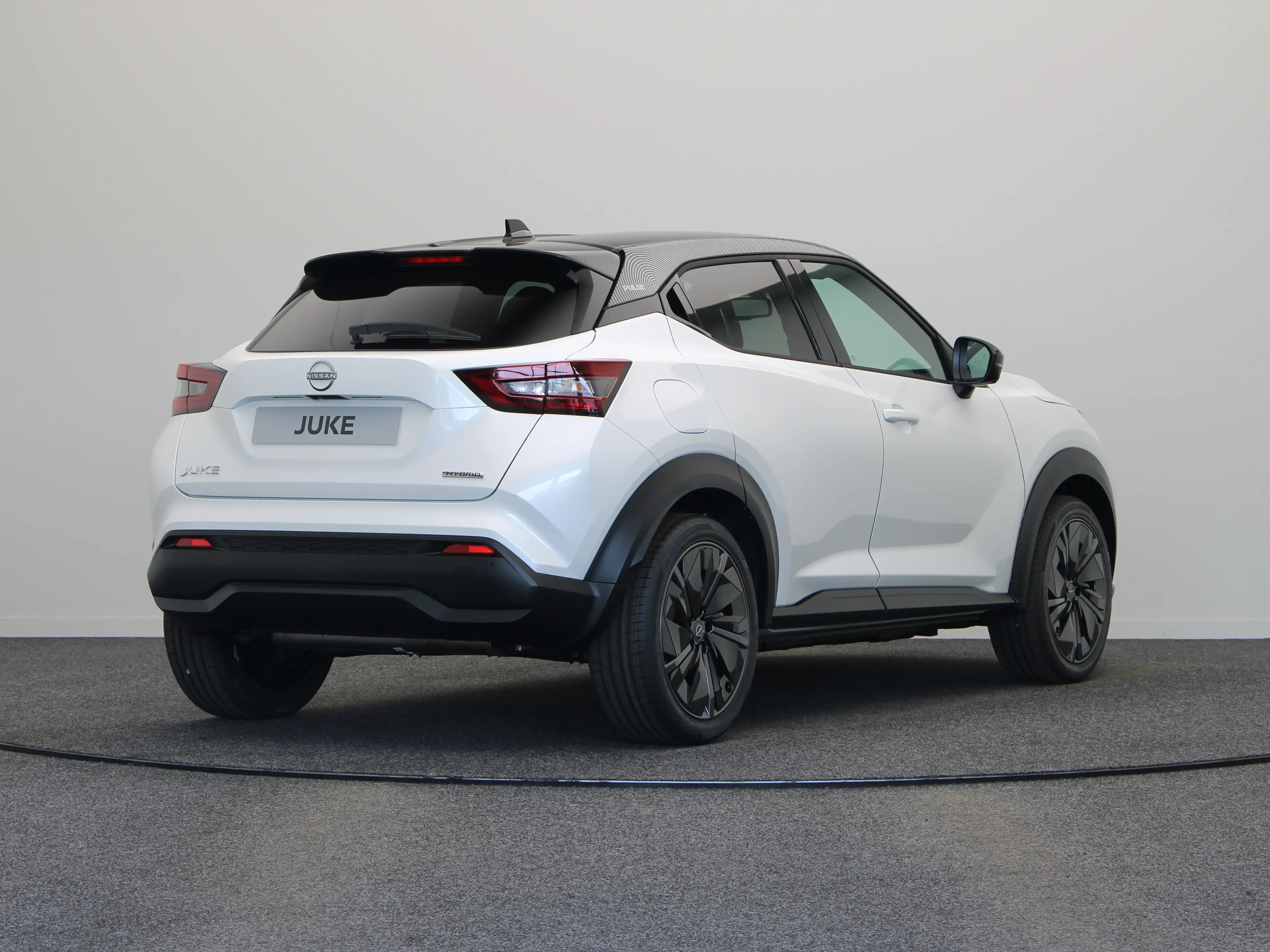 Nissan Juke Pulse Hybrid 143 | "Interior Pack Plus” - donkerbl — photo 11