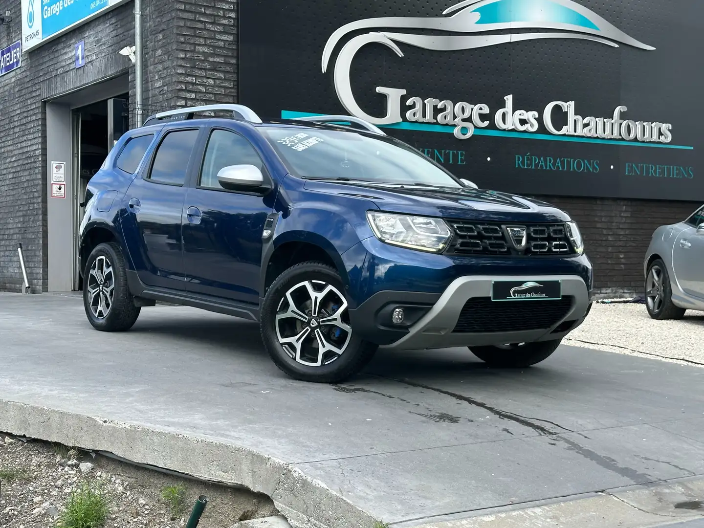 Dacia Duster 1.5 Blue dCi 4WD - ! Prestige ! - 1er Propr. - E6d Blauw - 2