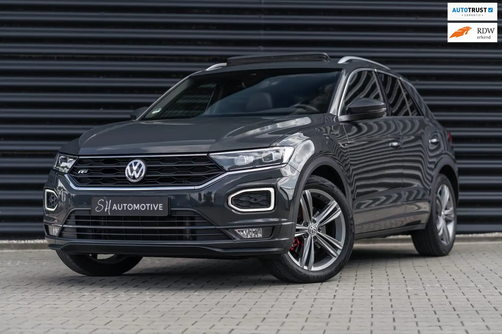 Volkswagen T-Roc 2.0 TSI 4Motion Sport R-Line / PANO / CARPLAY / TR Grau - 1