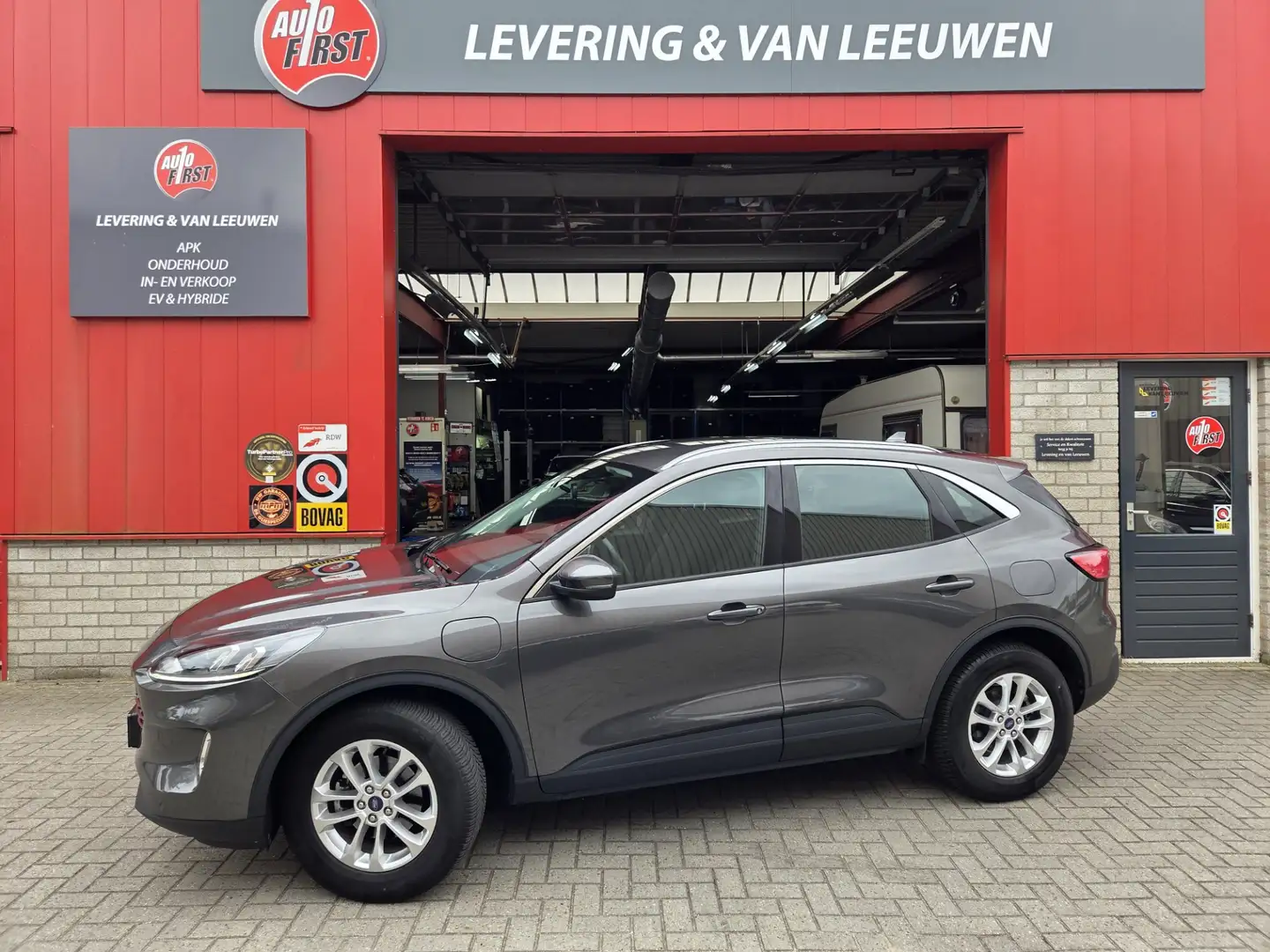 Ford Kuga 2.5 PHEV Titanium Navigatie/ Camera/ Stoelverwarmi Grijs - 1