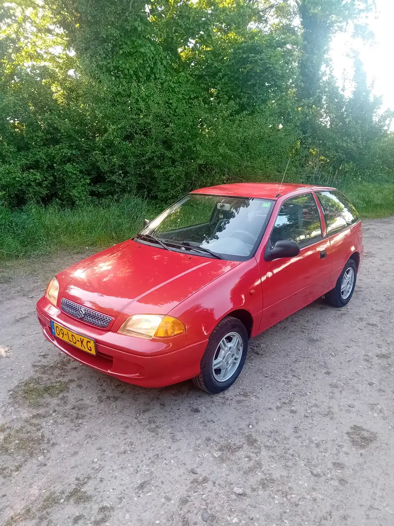 Suzuki Swift 1.0 Eco Rood - 1