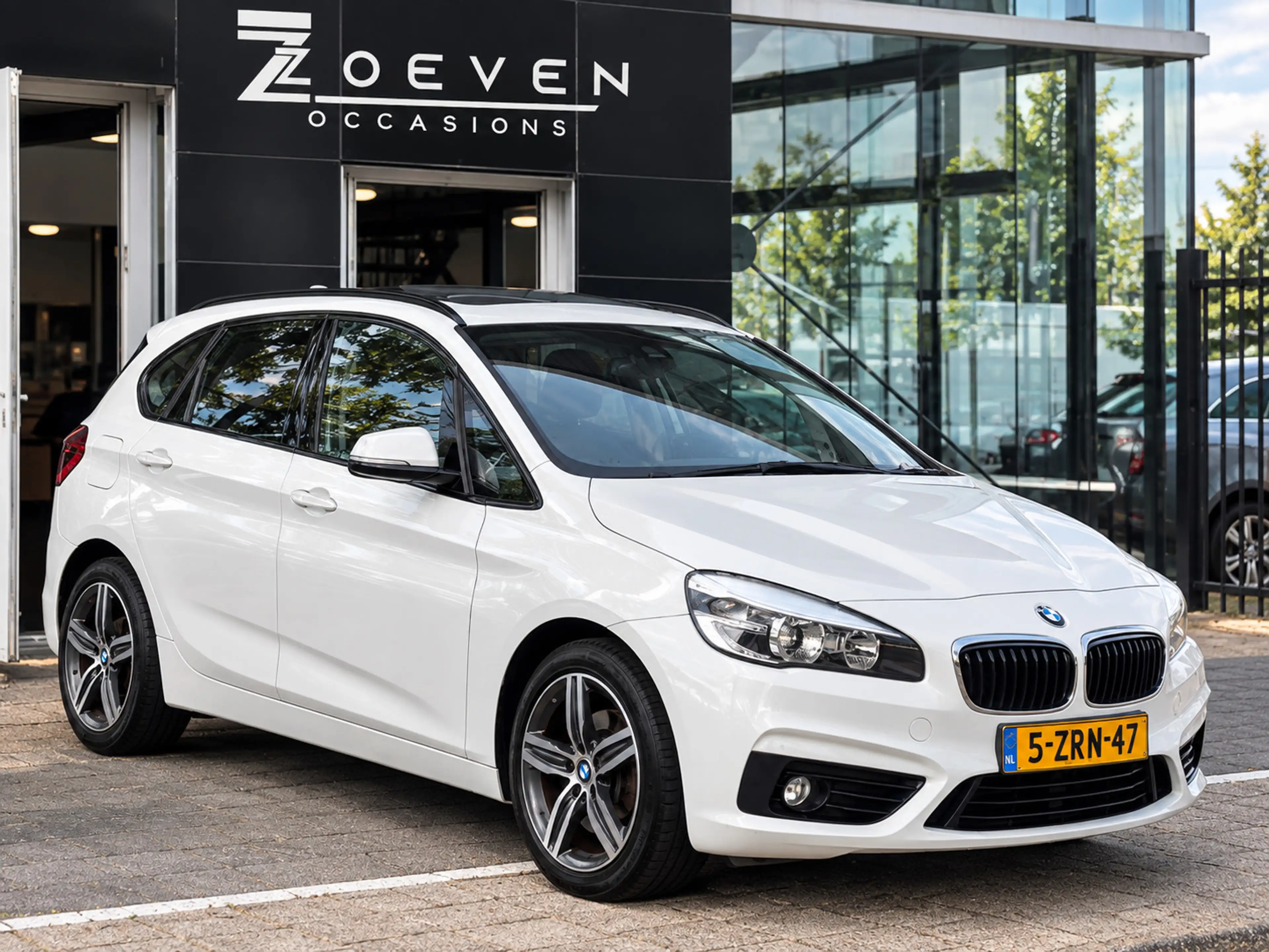 BMW 220 2-serie Active Tourer 220i Executive | Pano | Navi — photo 2