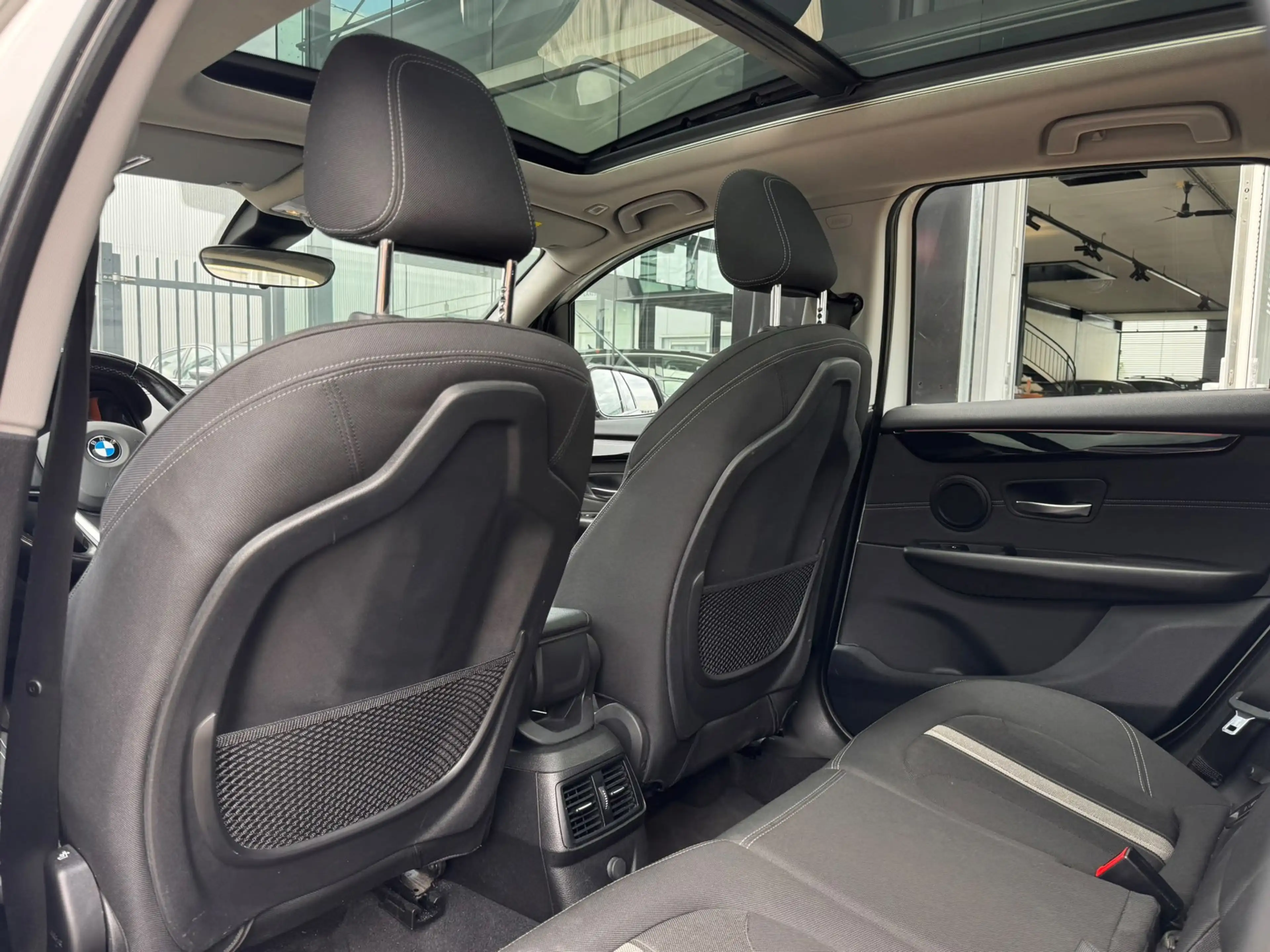 BMW 220 2-serie Active Tourer 220i Executive | Pano | Navi — photo 14