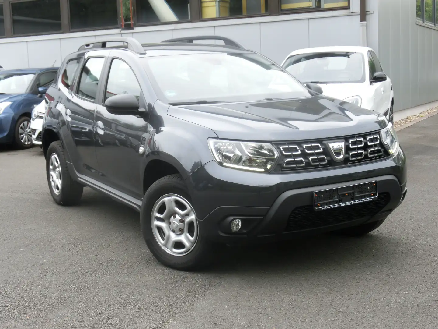 Dacia Duster 115 2WD Comfort/ Klima, Tel,  e.FH, PDC Grau - 1