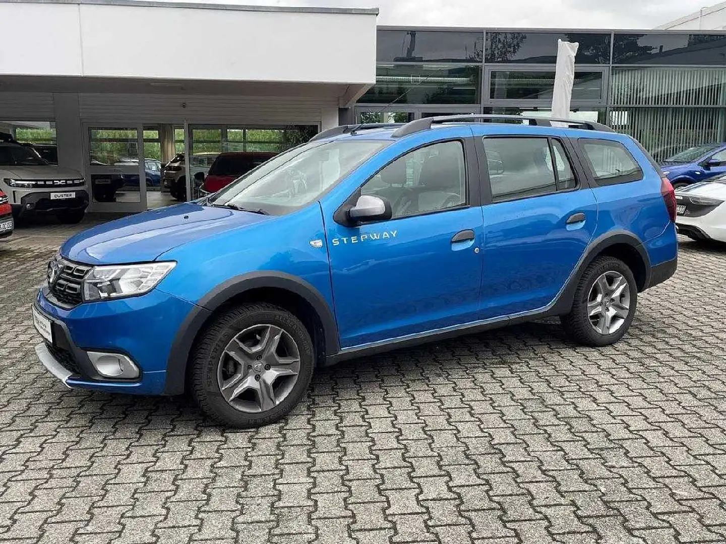 Dacia Logan Stepway TCe 90 Celebration PDC Navi uvm Blau - 1