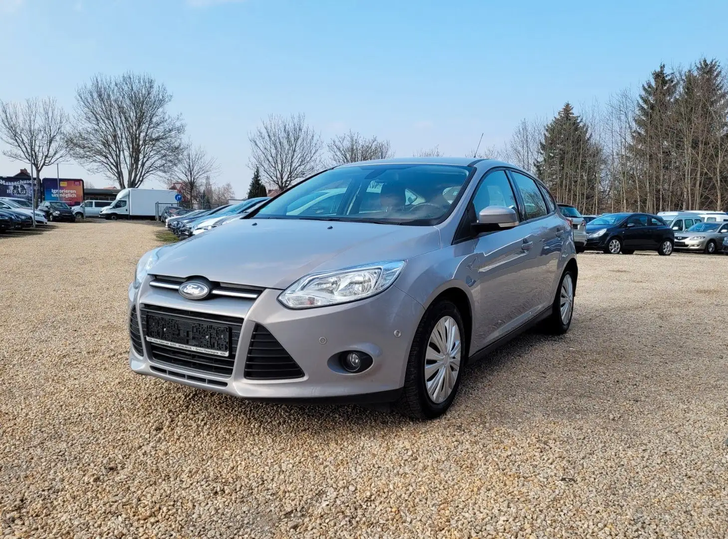Ford Focus Lim. Champions Edition*ParkAss*Klima*PDC* Silber - 1