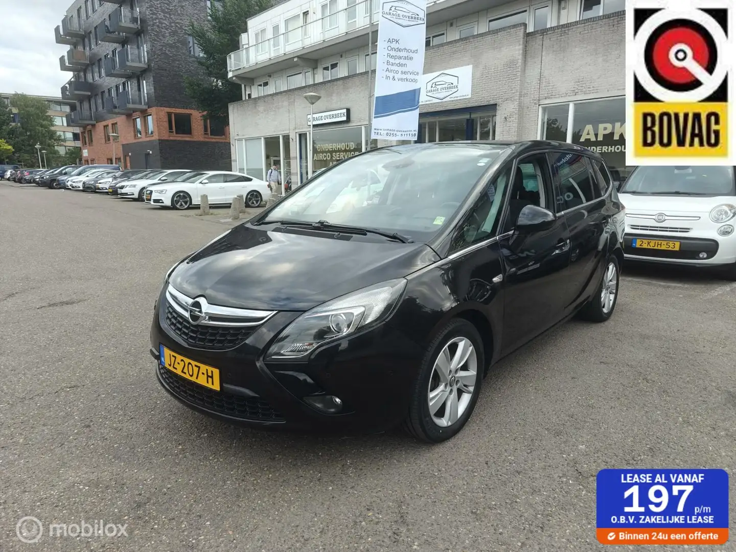 Opel Zafira Tourer 1.4 2015 7PERS/CRUISE/AIRCO/PANO/PDC/APK! Zwart - 1
