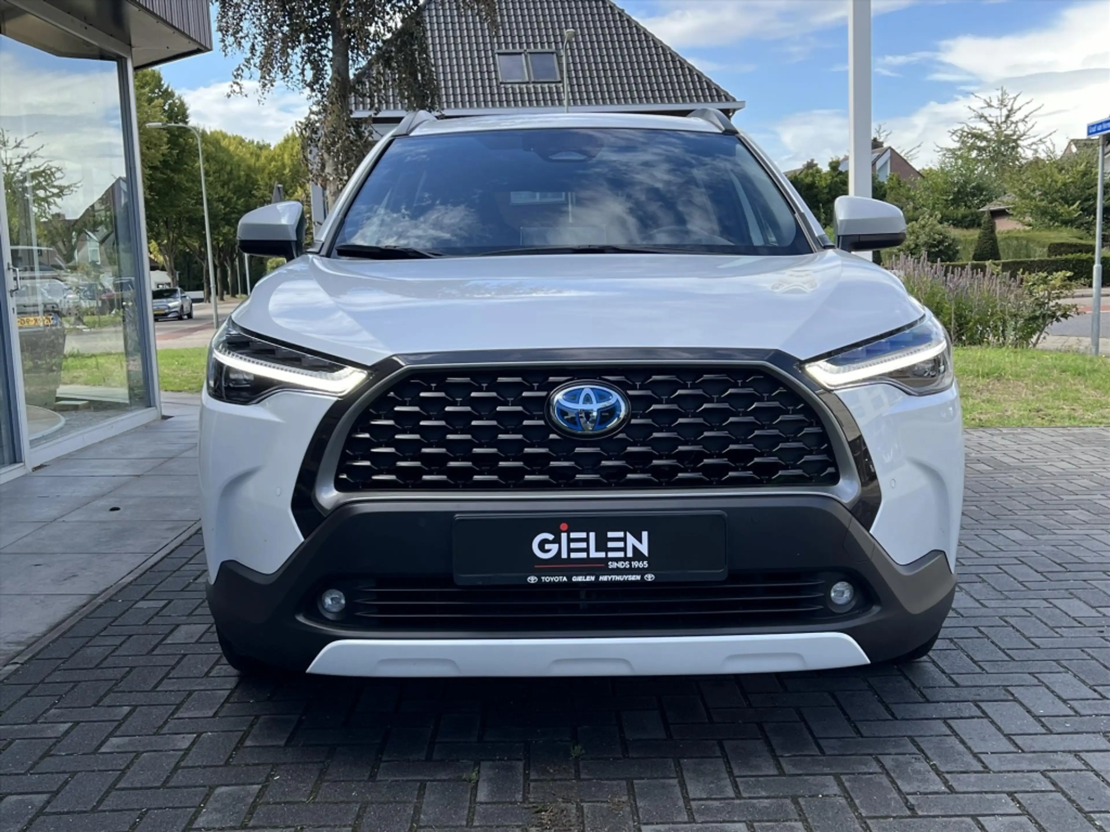 Toyota Corolla Cross 140 Hybrid Dynamic | Trekhaak, Parelmoer wit, Dode — photo 14