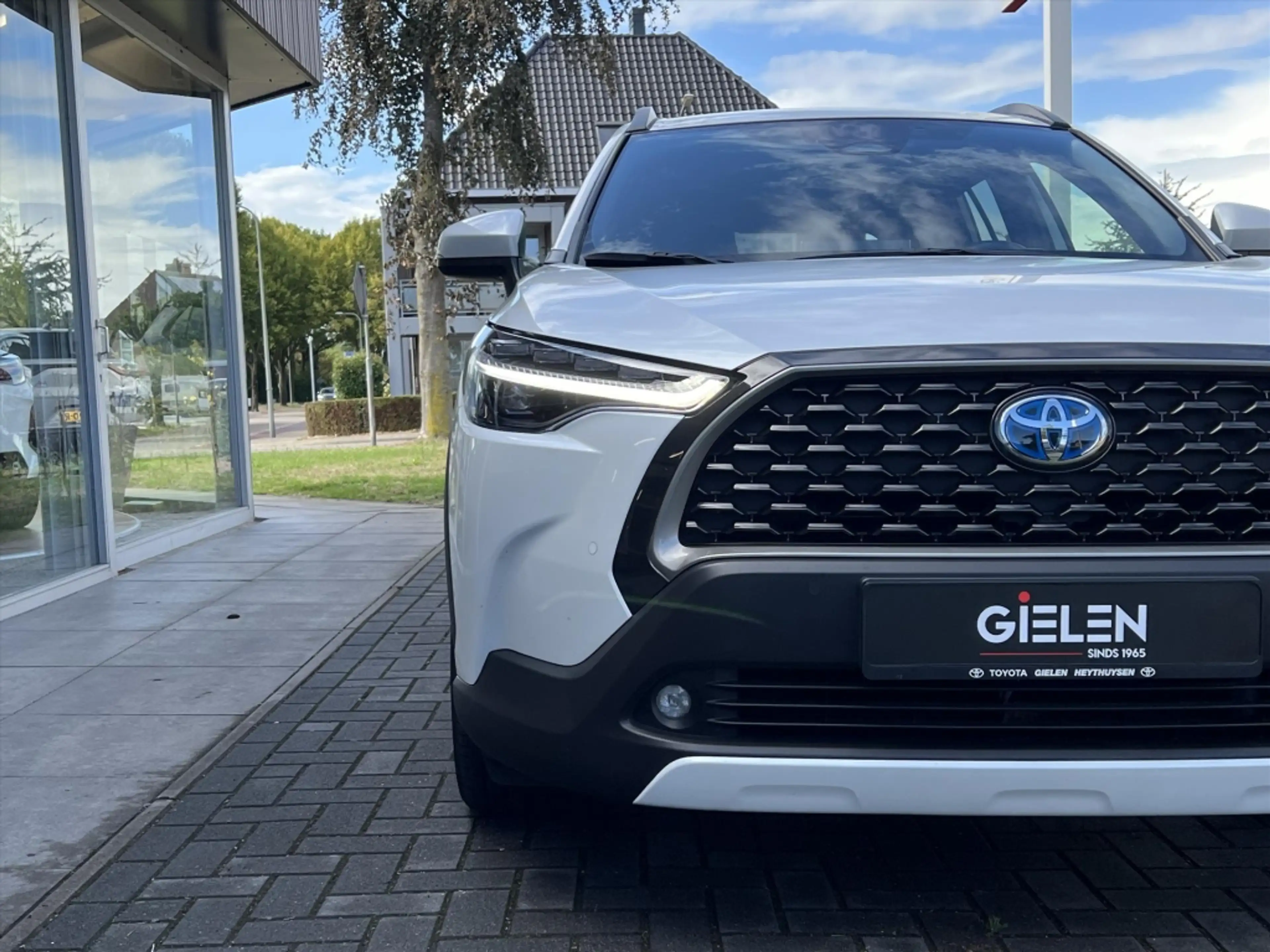 Toyota Corolla Cross 140 Hybrid Dynamic | Trekhaak, Parelmoer wit, Dode — photo 9