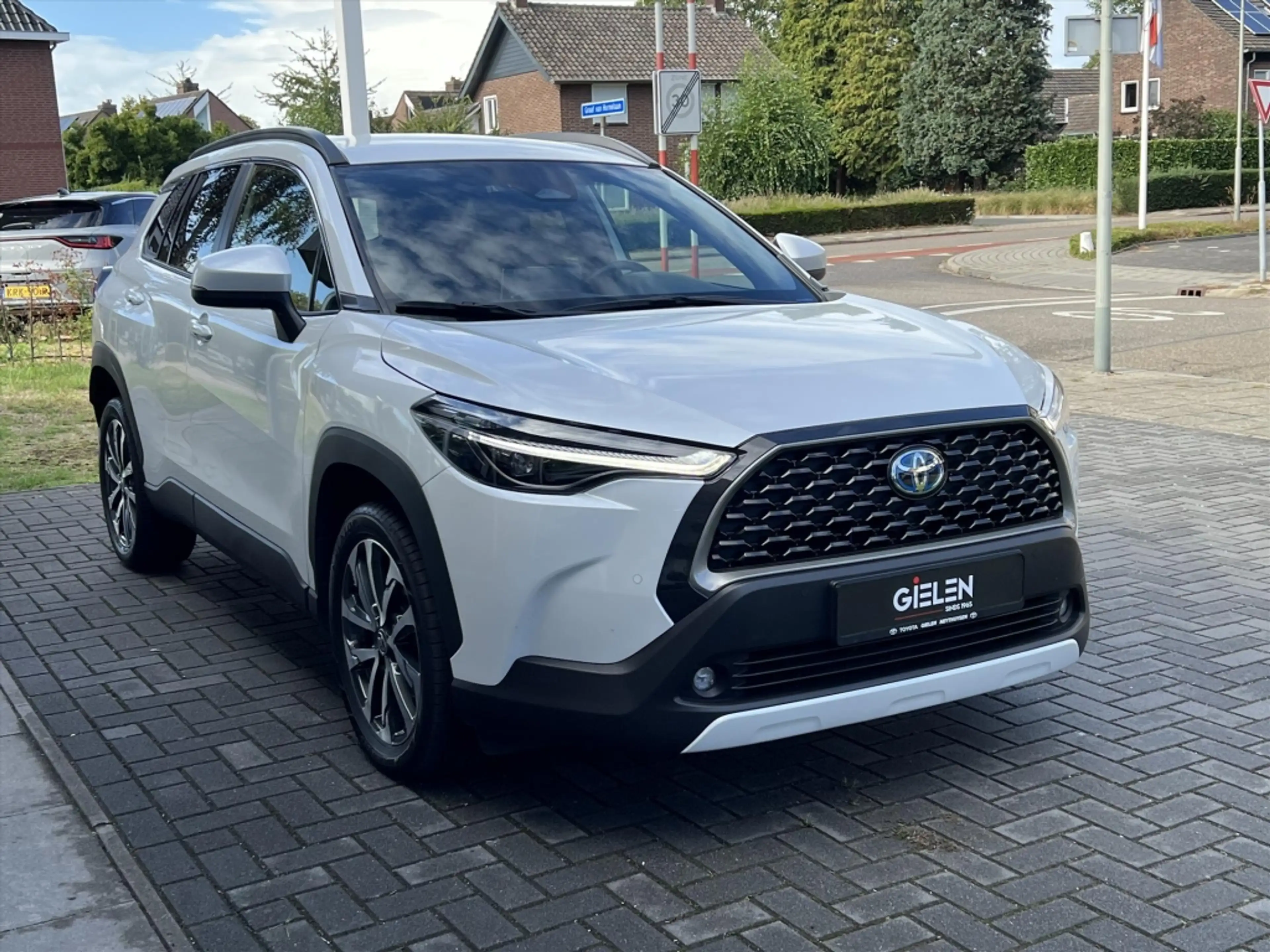 Toyota Corolla Cross 140 Hybrid Dynamic | Trekhaak, Parelmoer wit, Dode — photo 10