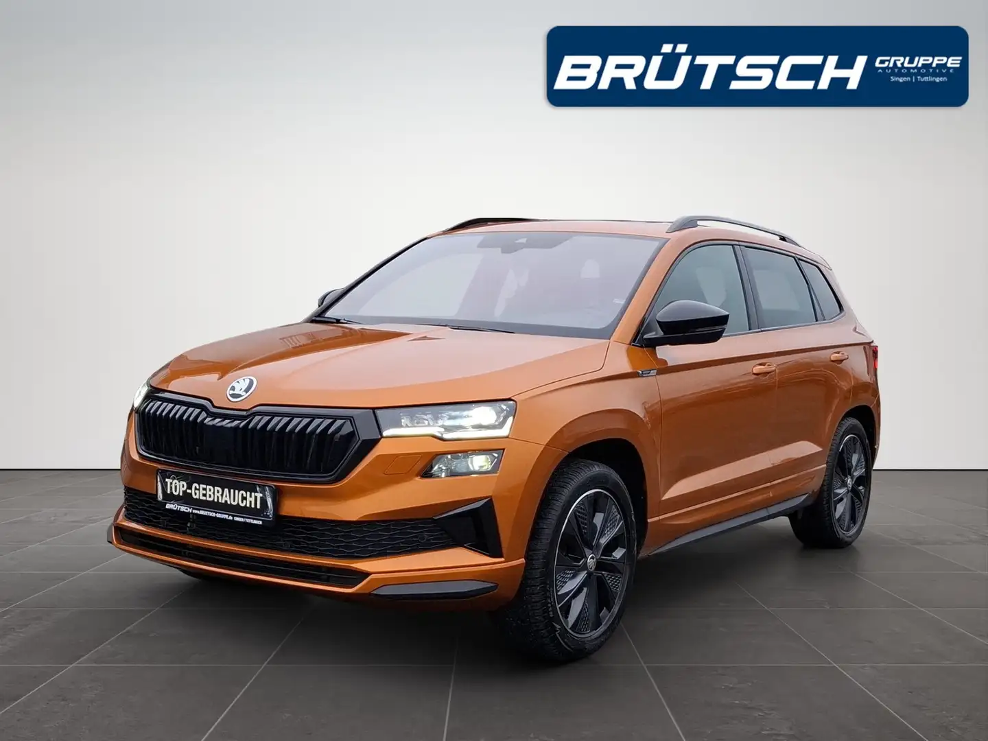 Skoda Karoq 2.0 TDI Sportline 4x4 DSG / AHK / PANORAMA / STHZG Pomarańczowy - 1