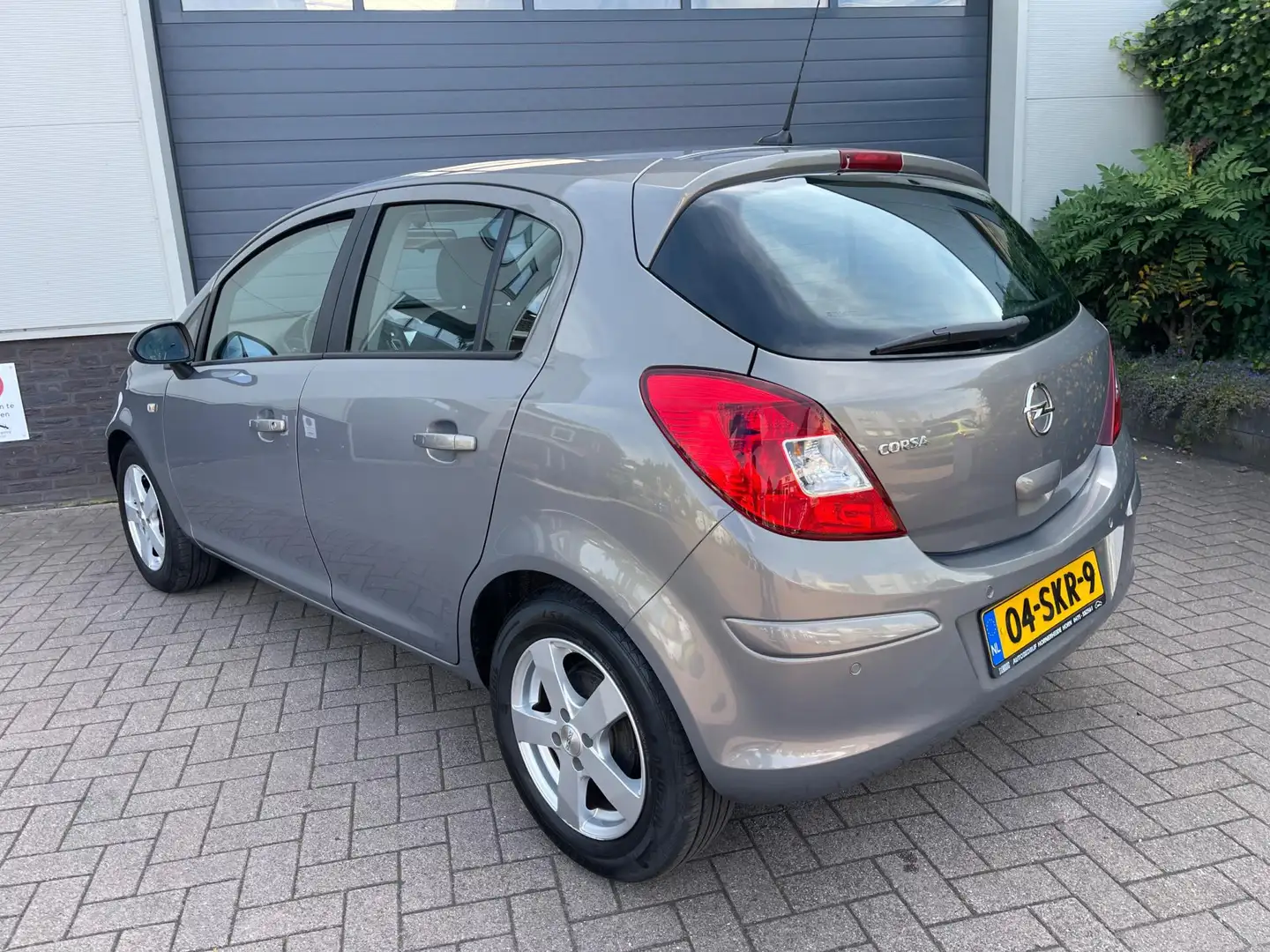 Opel Corsa 1.2-16V Edition/Automaat/Navi/PDC/Bluetooth/Airco/ Braun - 2