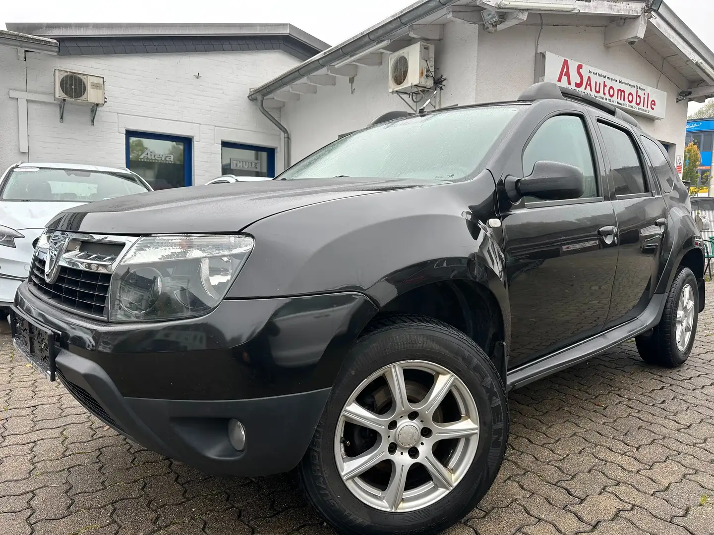 Dacia Duster 1.6 16V 4x4 Allrad+AHK+2.HAND+KLIMA+6.GANG Schwarz - 1