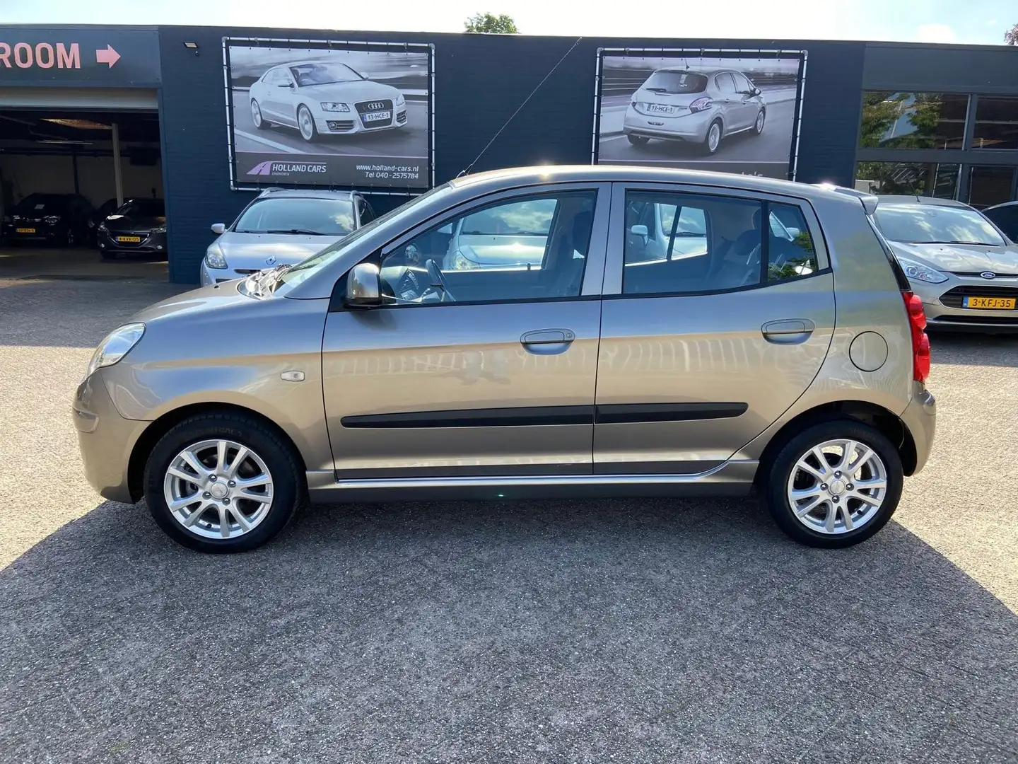 Kia Picanto 1.0 Seven - 1e Eigenaar dealer onderhouden 104.354 Grigio - 1