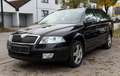 Skoda Octavia Combi 2.0 FSI 4X4/NAVI/SHZ/PDC/AHK/XENON Schwarz - thumbnail 1