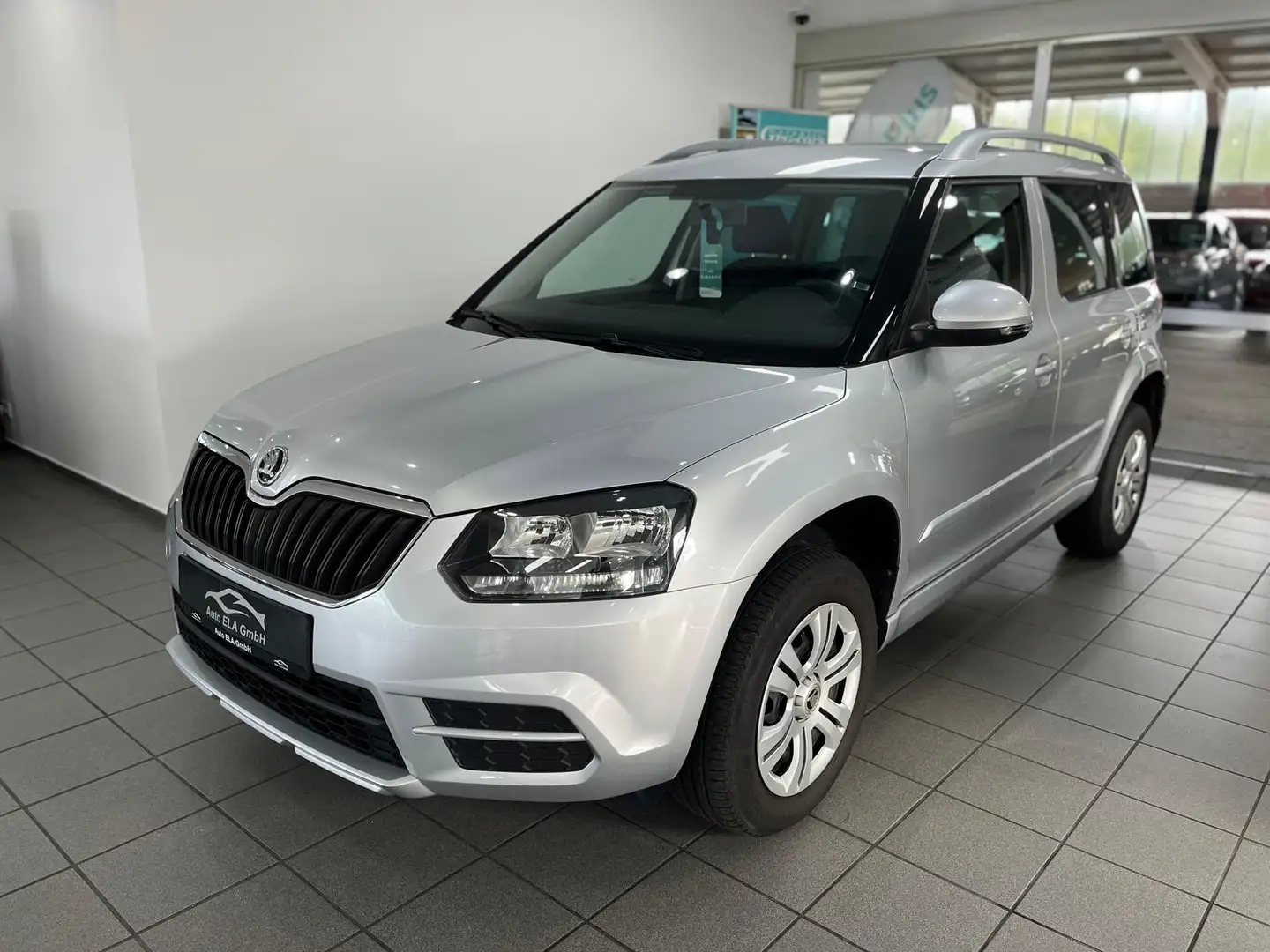 Skoda Yeti 1.2 TSI DSG Aut. 1.Hand|AHK|PDC|Sitzheizung Silber - 1