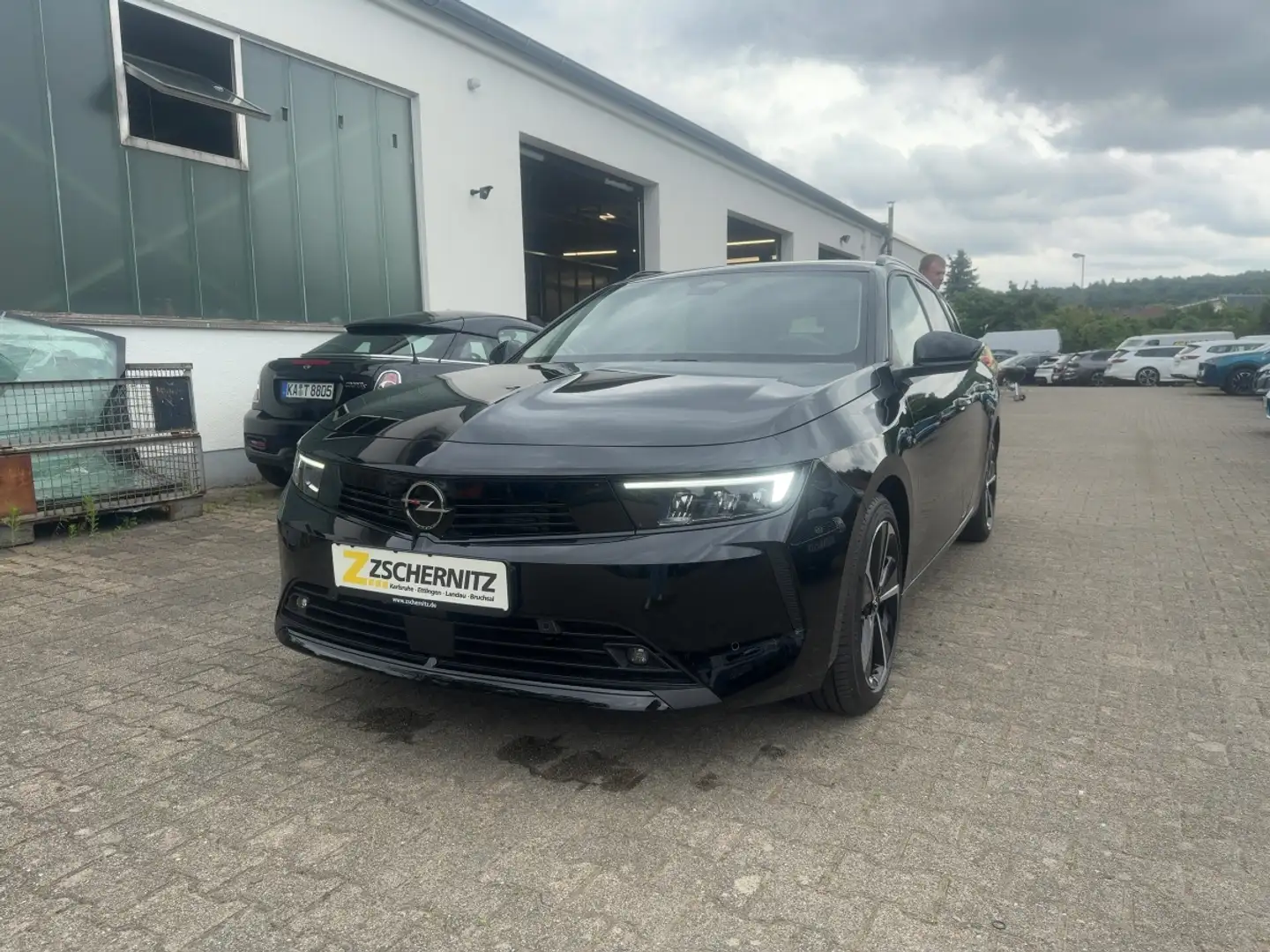 Opel Astra L Sports Tourer 1.6 Turbo Plugin Elegance Schwarz - 1
