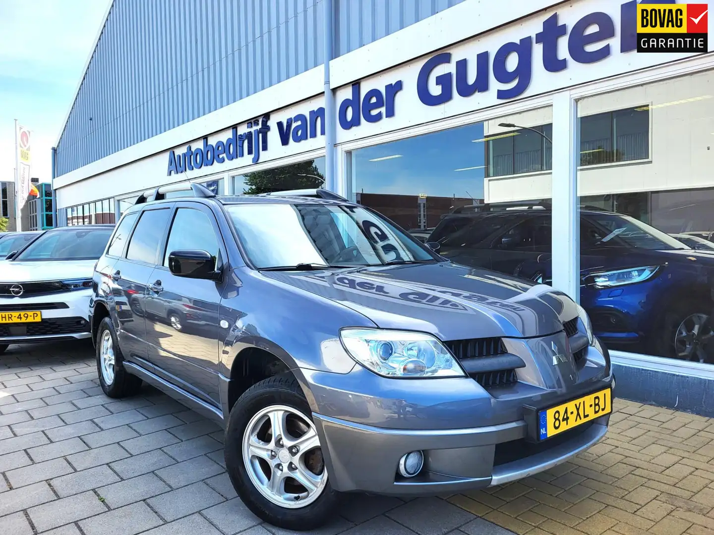 Mitsubishi Outlander Sport 2.0 Invite+ / 78.000 Km NAP / Airco / Trekha Grijs - 1