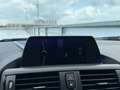 BMW 116 1-serie 116i High Executive | Pano | Xenon | Clima Zwart - thumbnail 9