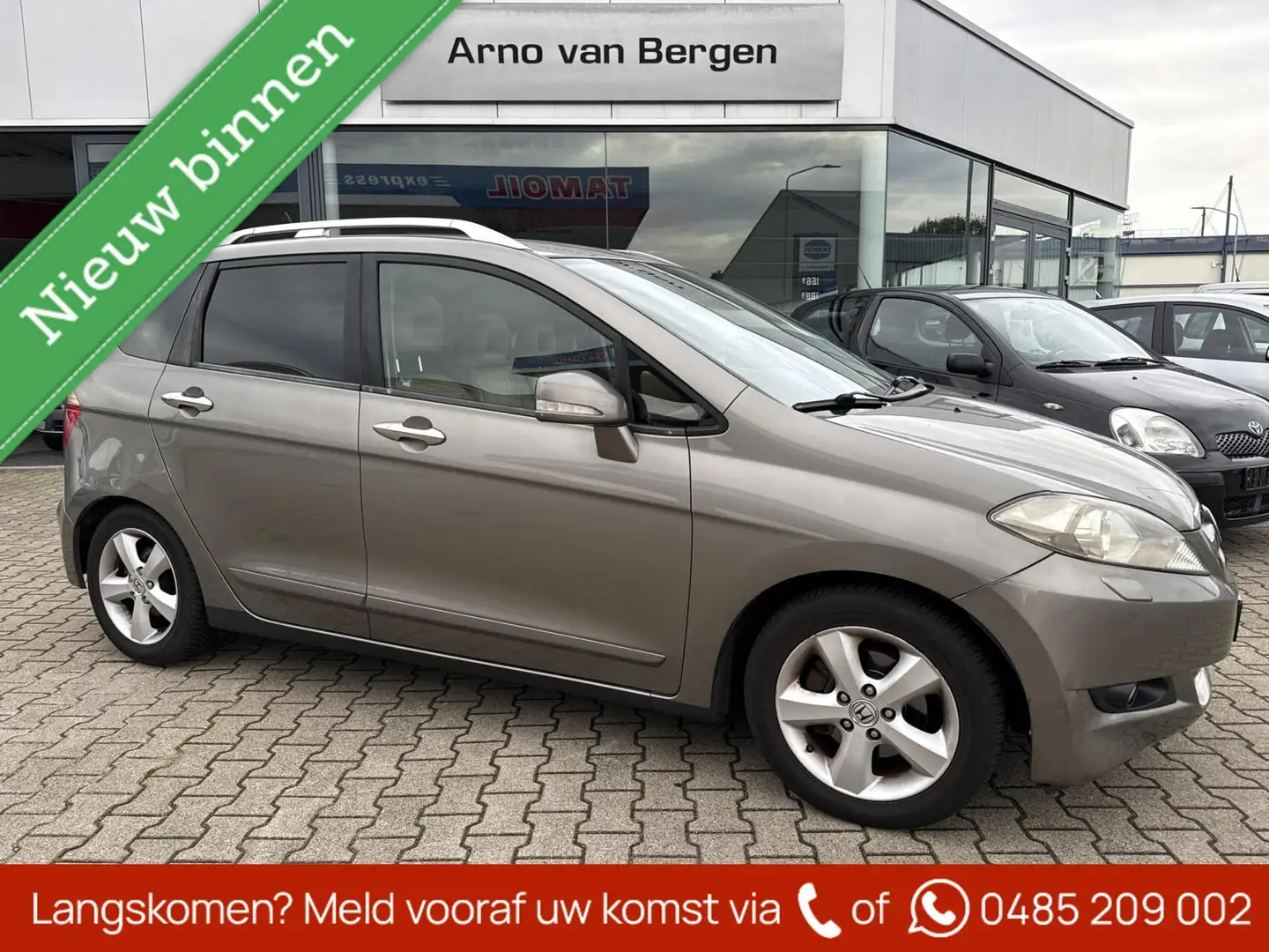Honda FR-V 1.8i Executive, 6 persoons, leder, schuif-/kanteld Bruin - 1