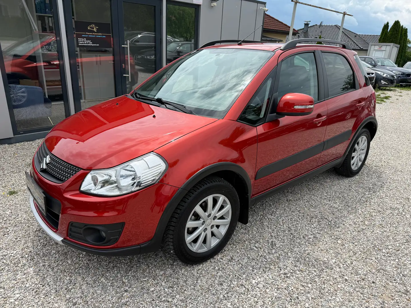 Suzuki SX4 1,6 GLX 4WD Navigator Orange - 1