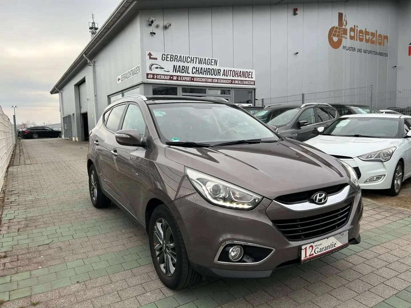 Hyundai iX35 blue 2WD Finale Pano Teilleder Navi LED SHZ Brown - 1