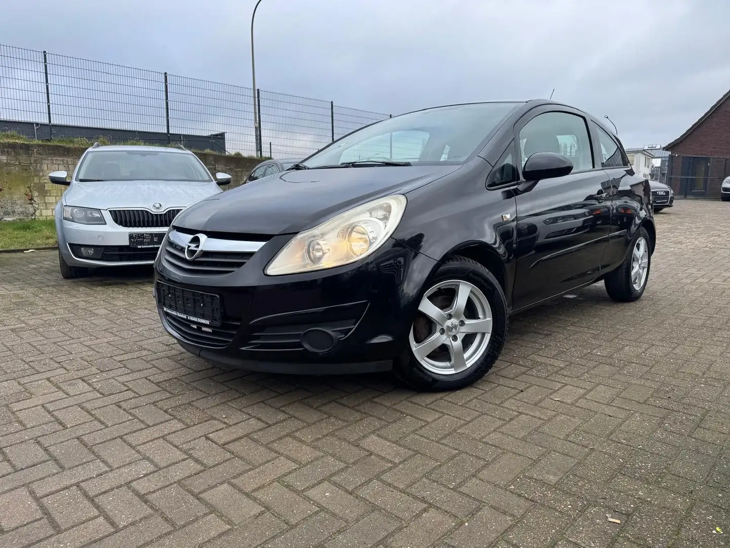 Opel Corsa D Edition/ Schwarz - 1