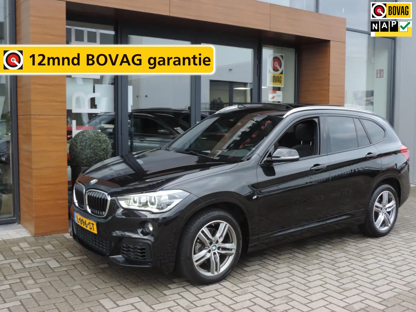 BMW X1 SDrive18i High Executive M-sport 74.000km | Panora Zwart - 1