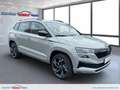 Skoda Karoq Sportline 2,0 TSI DSG 4X4 Matrix Pano AHK Klima Gris - thumbnail 1