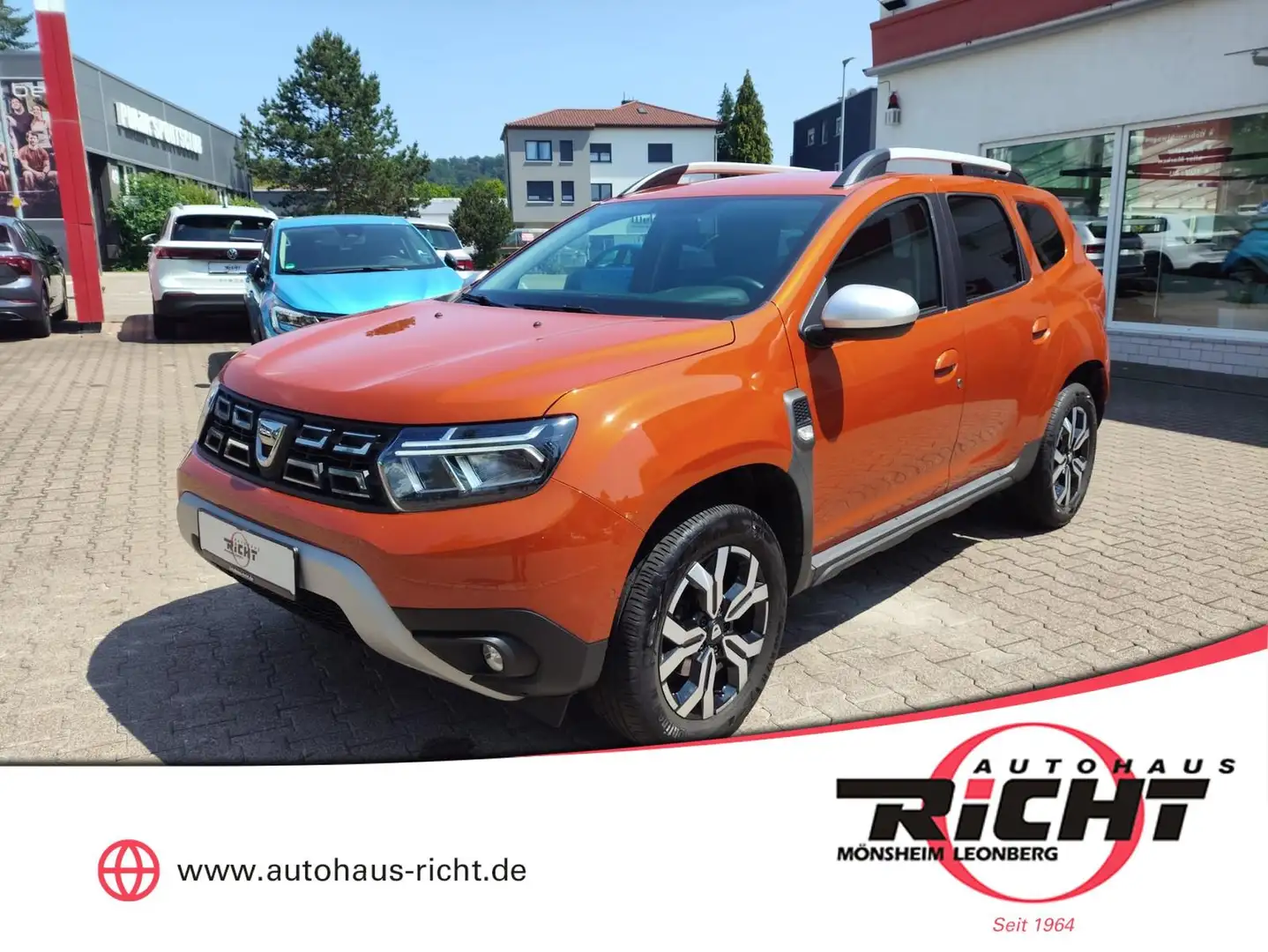 Dacia Duster 1.3 TCE Prestige Aut. Navi AHK SHZ Kamera Orange - 1