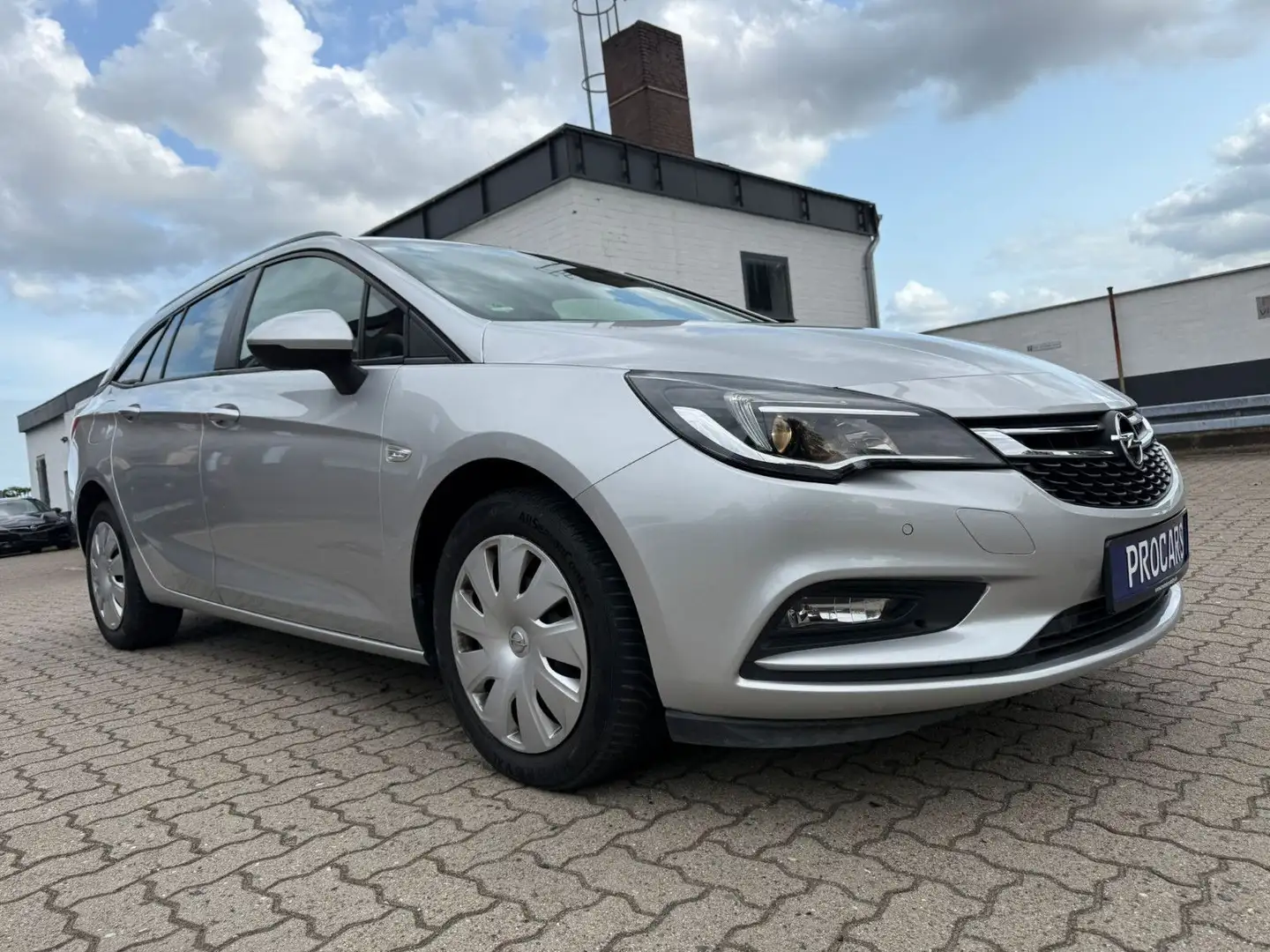 Opel Astra K 1. 0 ST Business*NAVI*PDC*SITZHEIZ*EU6 Argent - 1