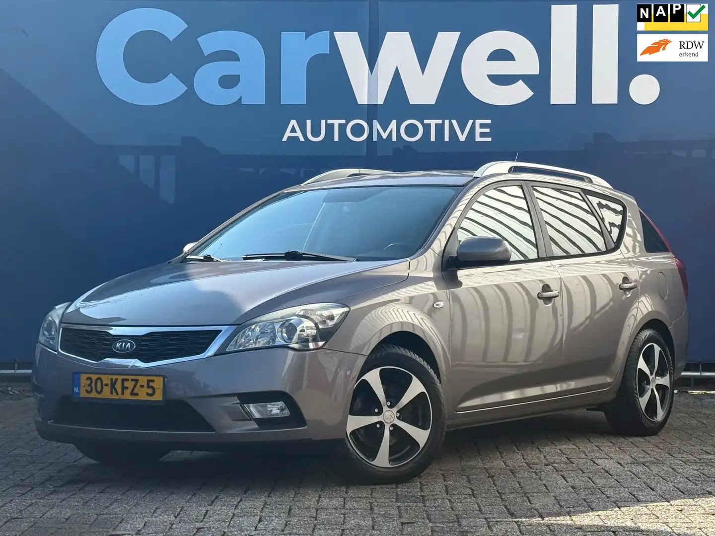 Kia Ceed / cee'd Sporty Wagon 1.4 CVVT X-ecutive Trekhaak,Climate,E Beige - 1
