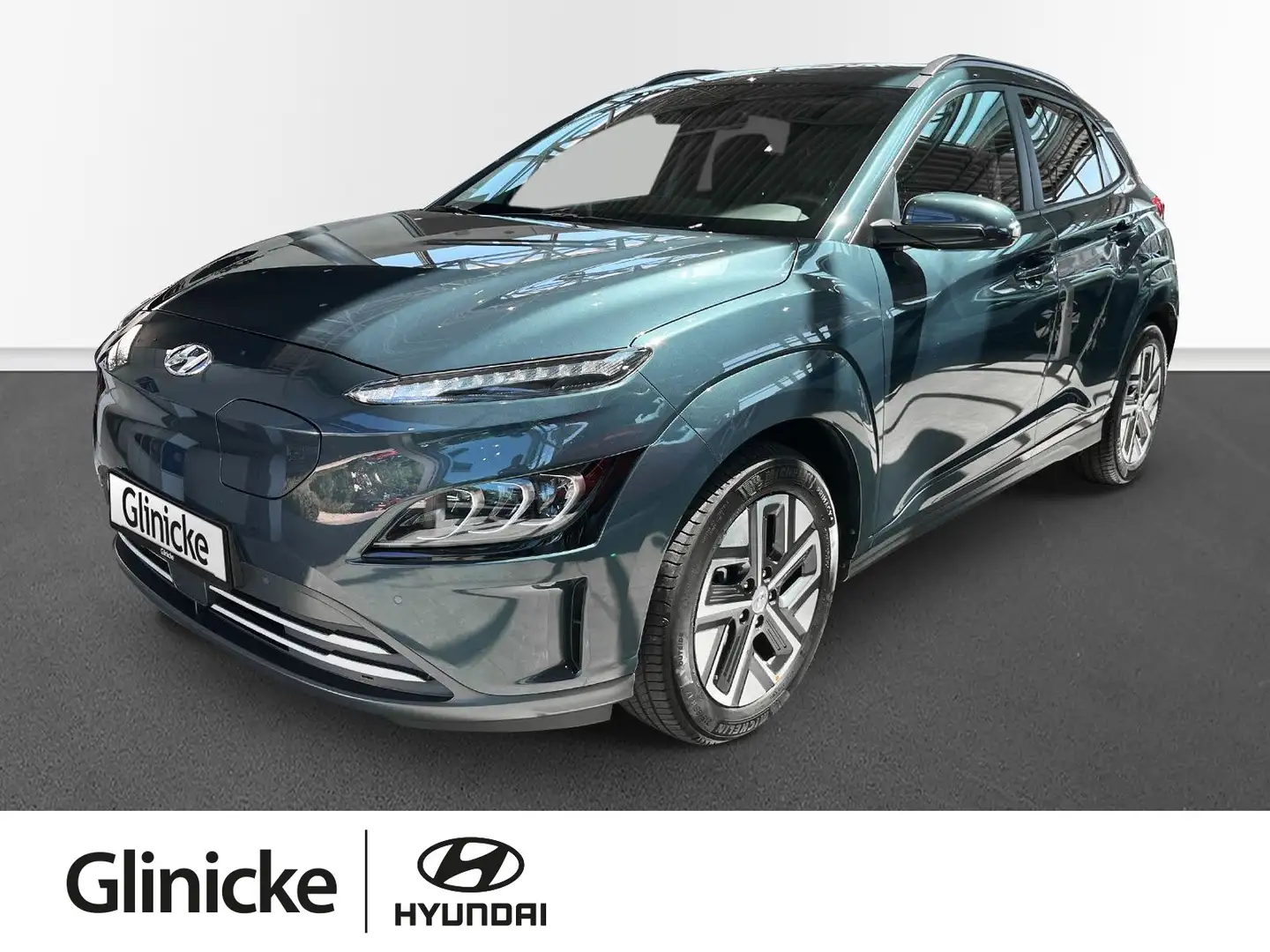Hyundai KONA KONA Elektro TREND*inkl.WinterRäd*NaviP*RKam*Sit Blau - 1