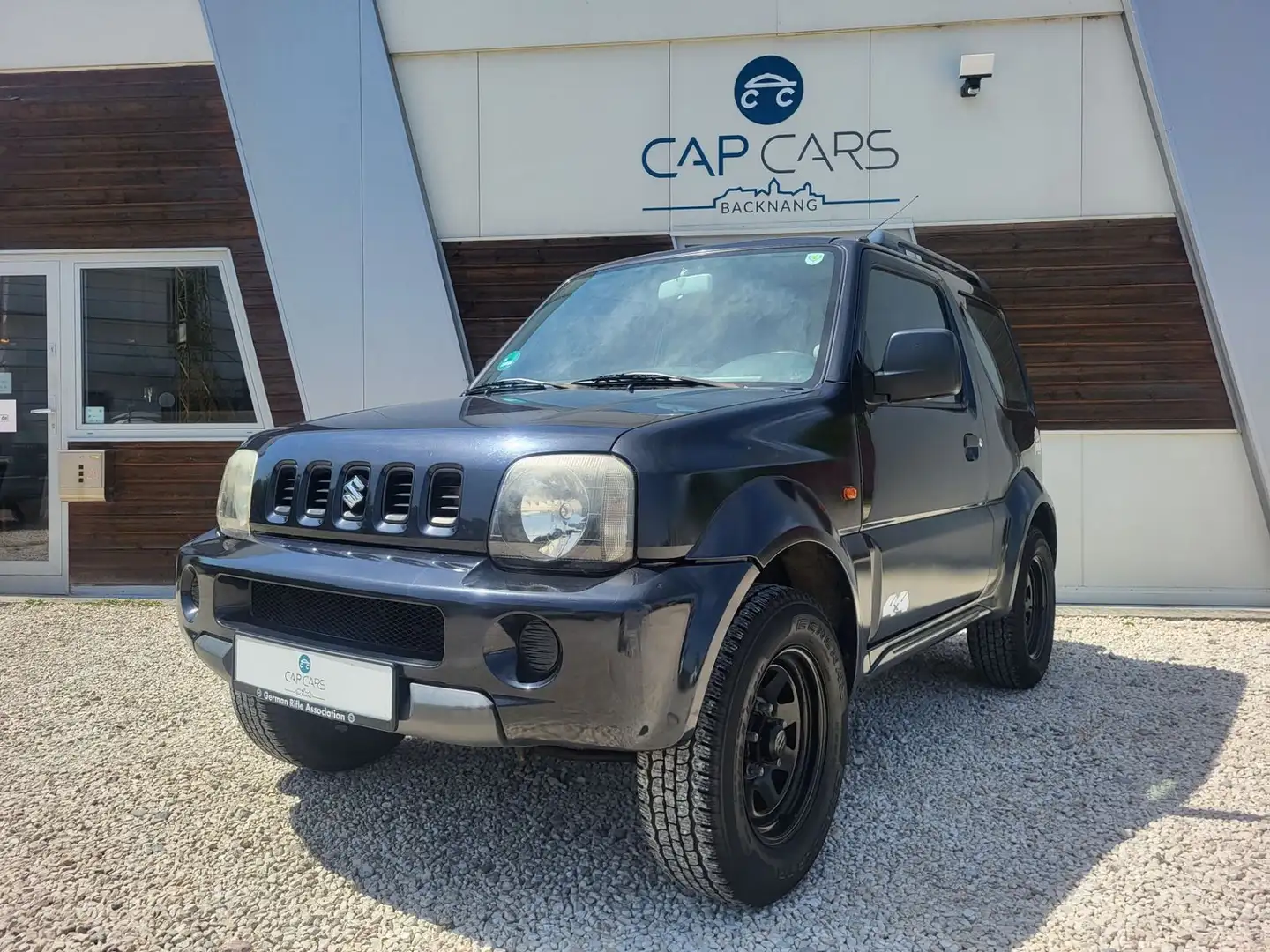 Suzuki Jimny 1.3b 86PS*Comfort*4x4 Zwart - 1