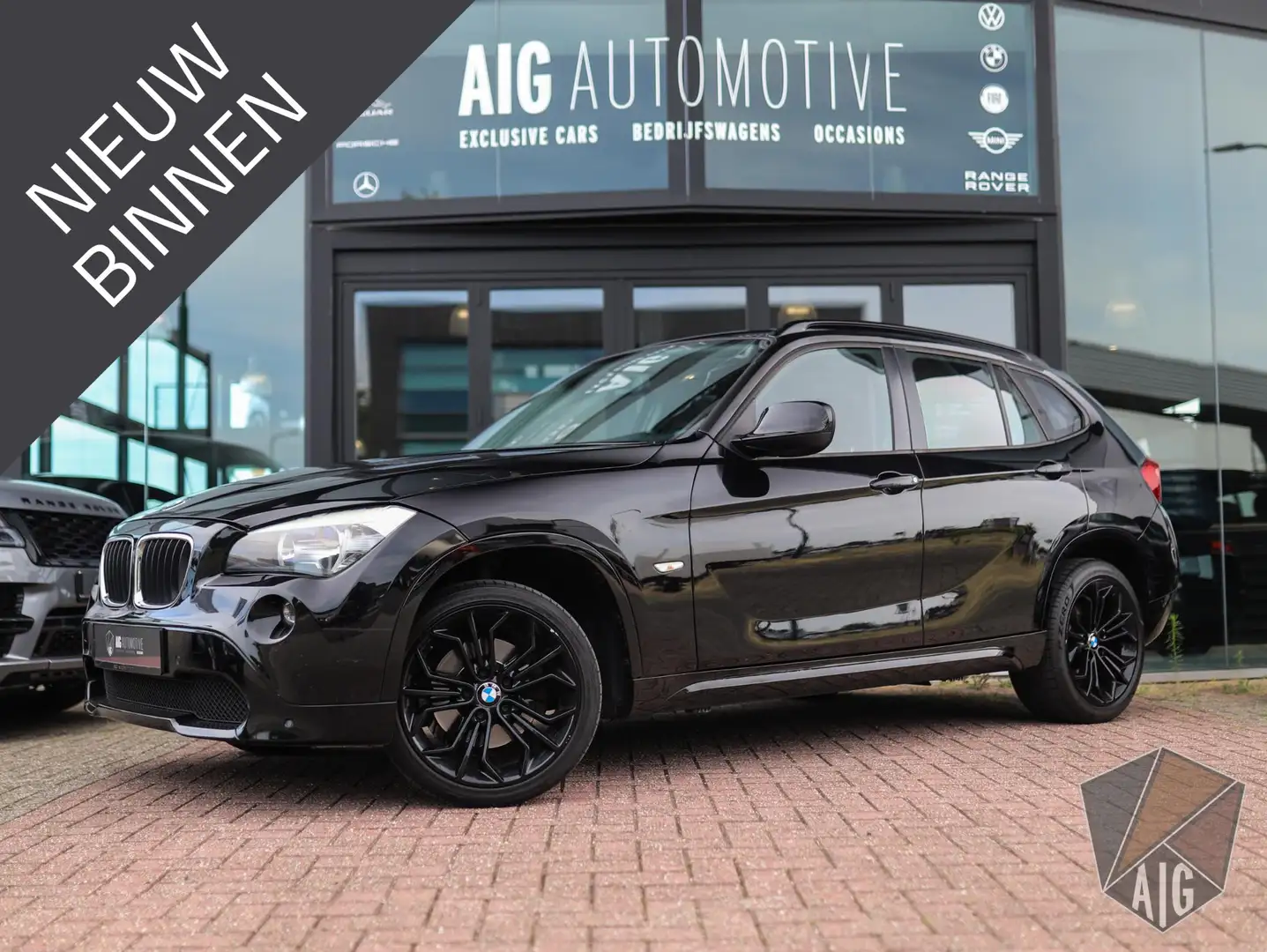 BMW X1 sDrive18i | Leder | Stoelverw. | Trekhaak | Airco Zwart - 1