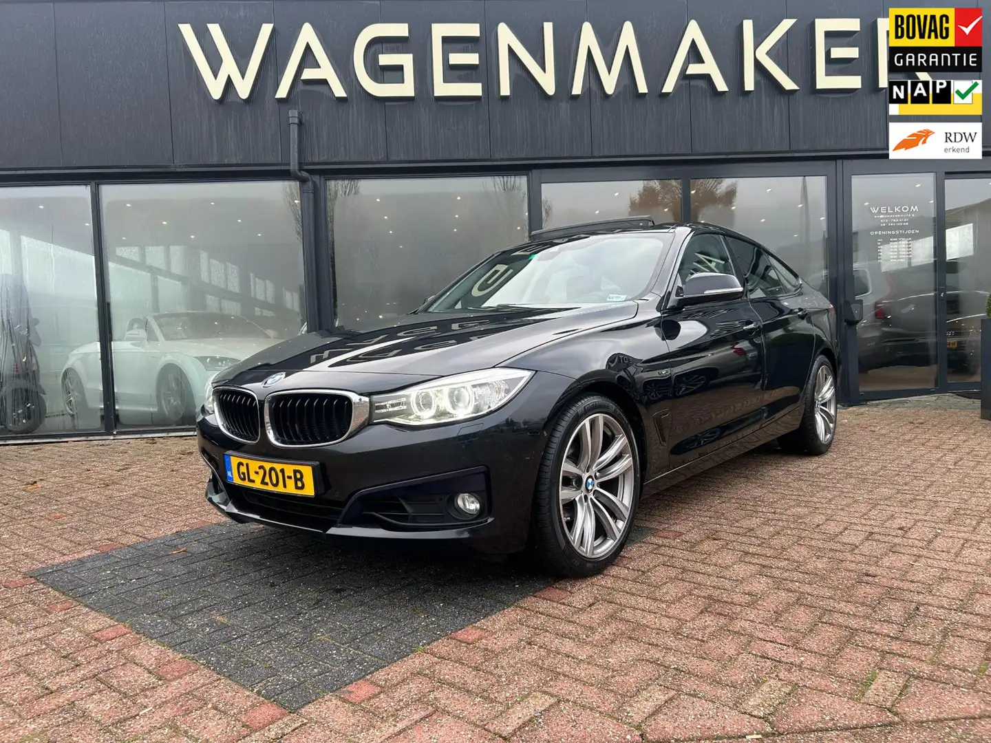 BMW 320 3-serie Gran Turismo 320i High Executive AUT|NAVI| Zwart - 1