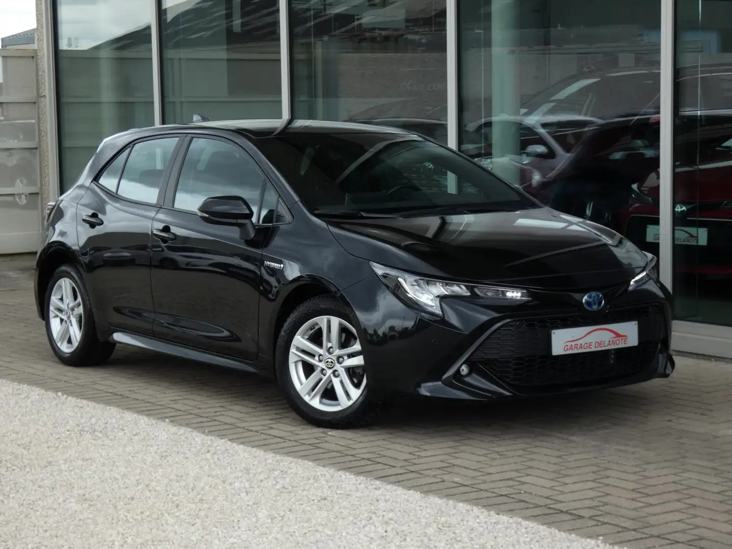 Toyota Corolla 1.8 Hybrid Dynamic +PARKEERSENSOREN GPS KEYLESS Zwart - 1