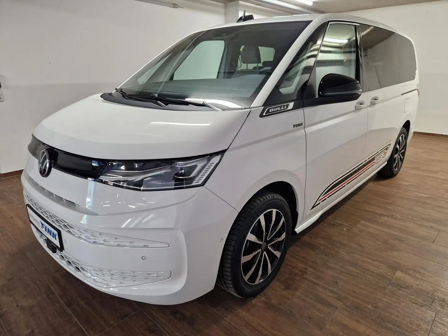 Volkswagen T7 Multivan Buisness eHybrid lang 4MOTION TSI mit ÜH 180 KW Weiß - 1