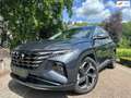 Hyundai TUCSON 1.6 T-GDI PHEV | Adaptive | Keyless | Dealer Onder Gris - thumbnail 1