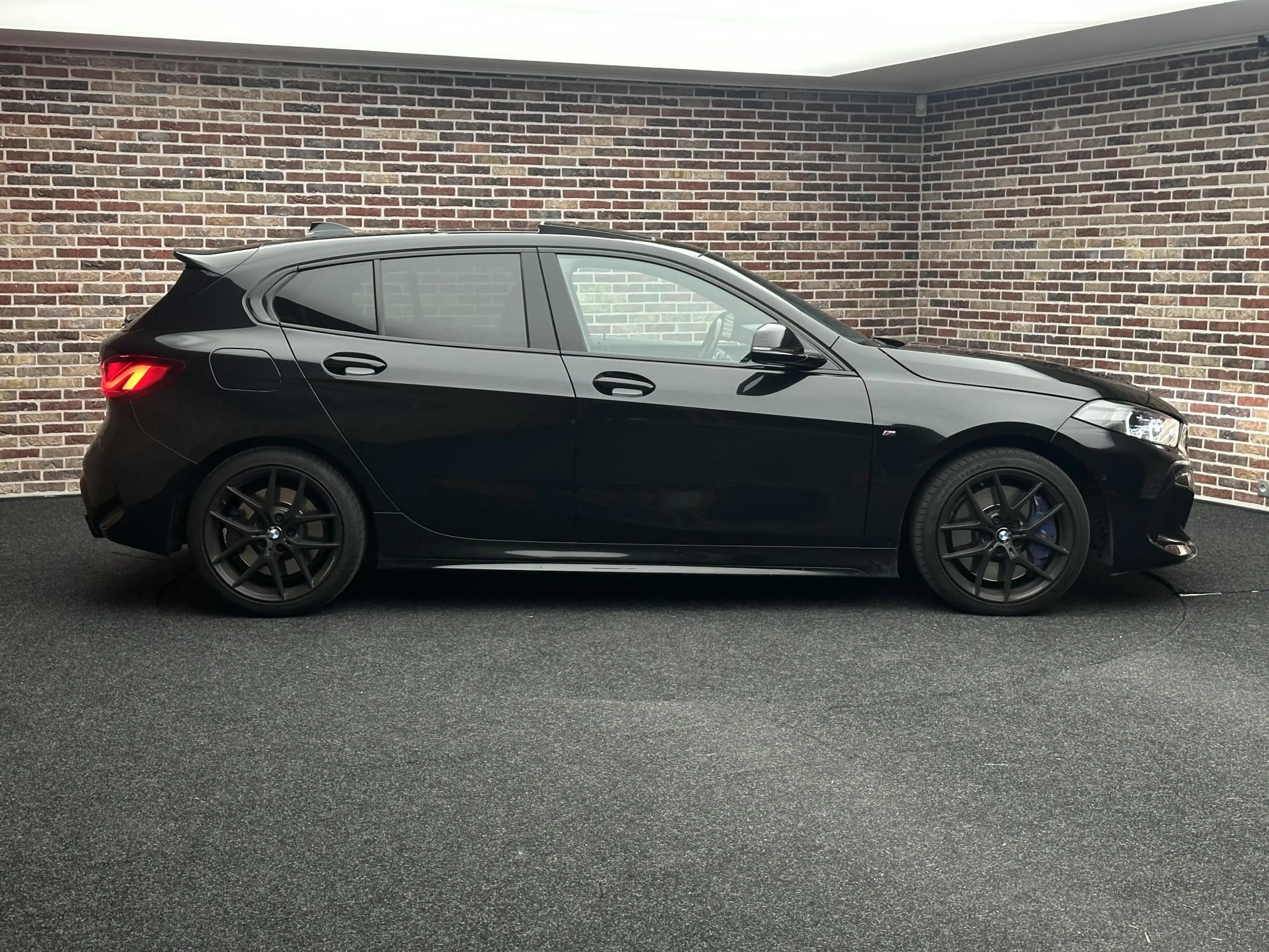 BMW 135 1-serie M135i xDrive Executive — photo 4