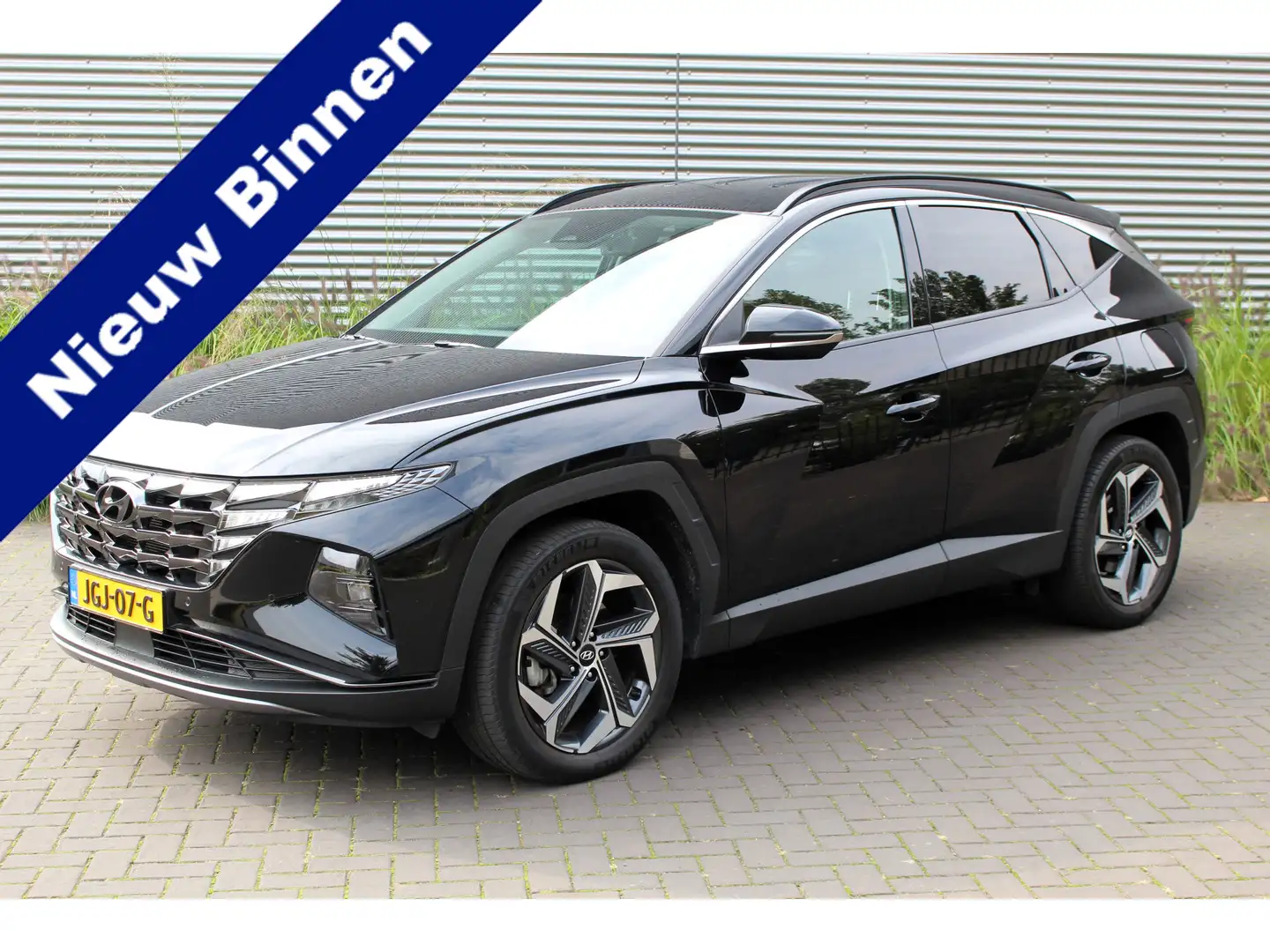 Hyundai TUCSON 1.6 T-GDI PHEV Comfort Smart 4WD I NAVI ADP. CRUIS Zwart - 1