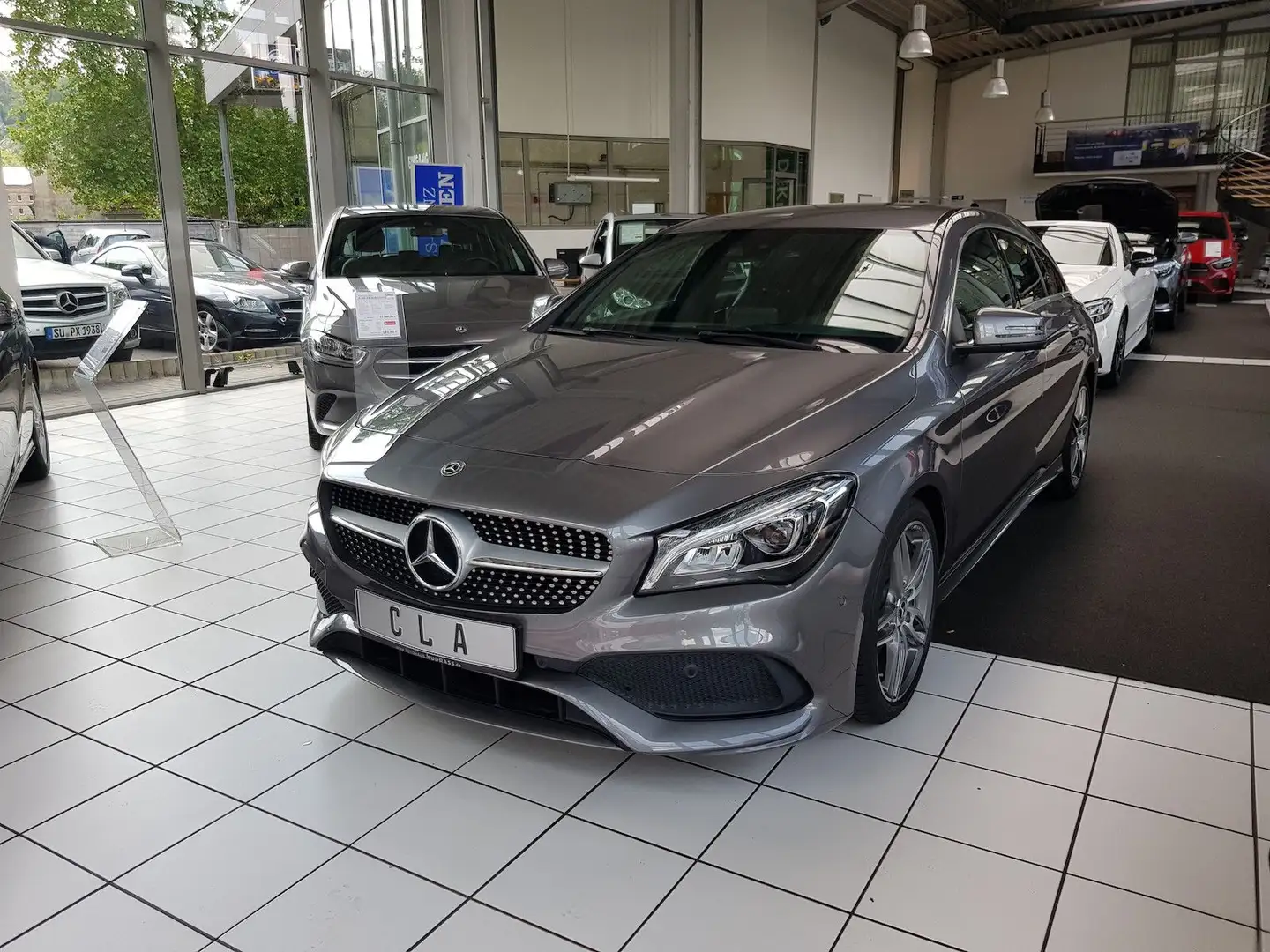 Mercedes-Benz CLA 180 AMG LED NAVI AUTO SHZ PTS Gris - 1
