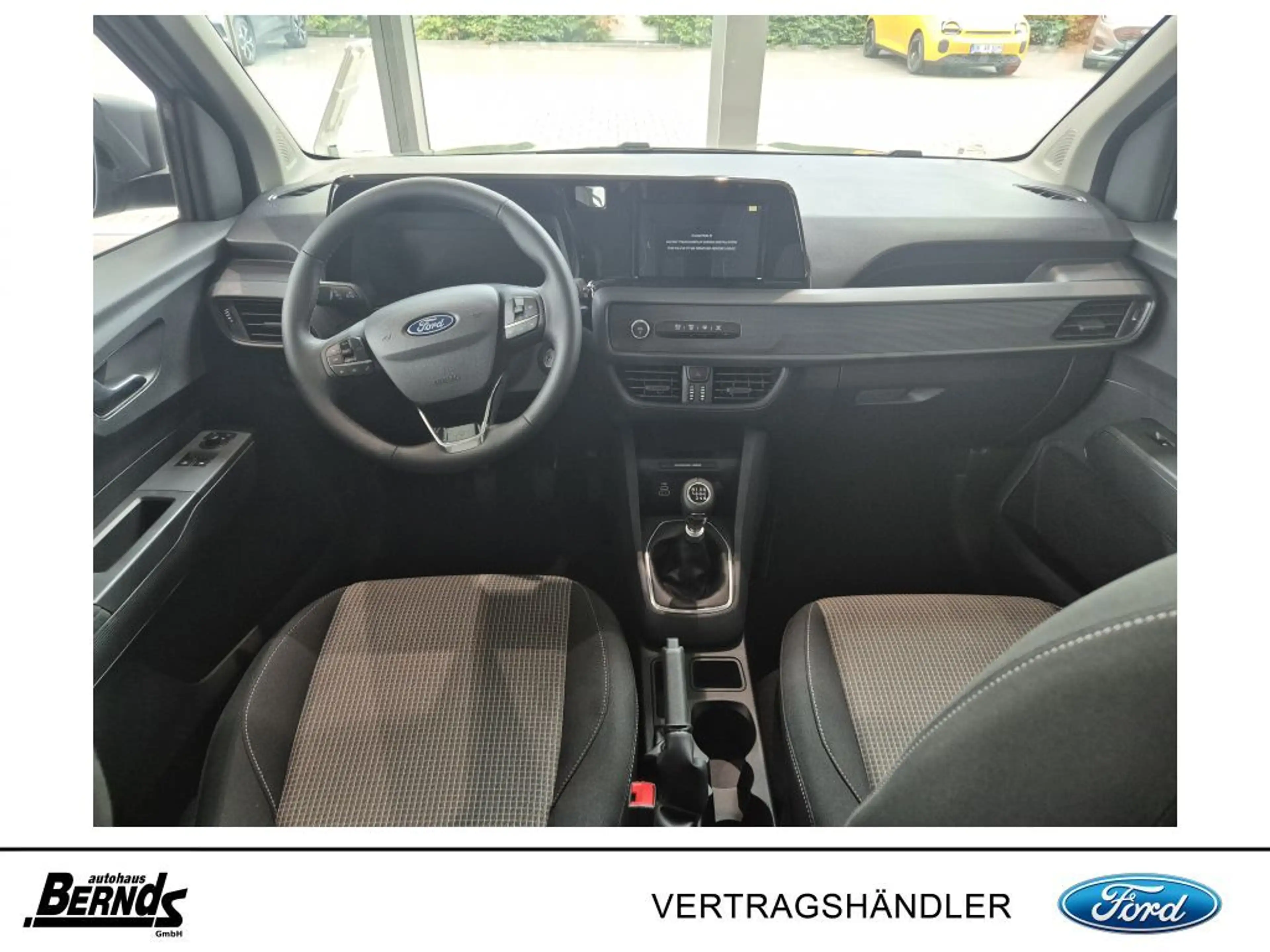 Ford Tourneo Courier 1.0 EcoBoost TREND KLIMA WINTERP. — photo 11