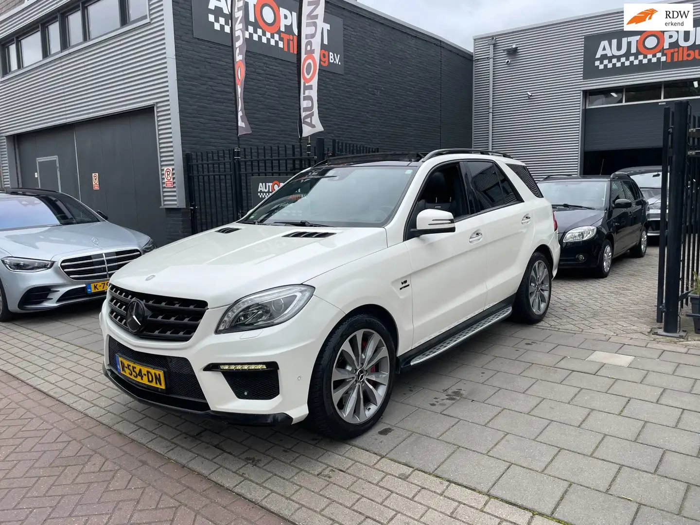 Mercedes-Benz ML 63 AMG M-klasse Performance Pack Trekhaak Airco NAP APK Weiß - 1