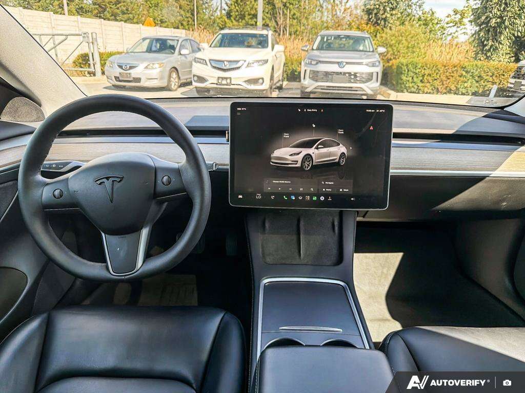used 2022 Tesla Model 3 car, priced at $33,745