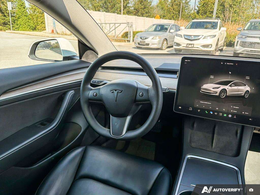 used 2022 Tesla Model 3 car, priced at $33,745