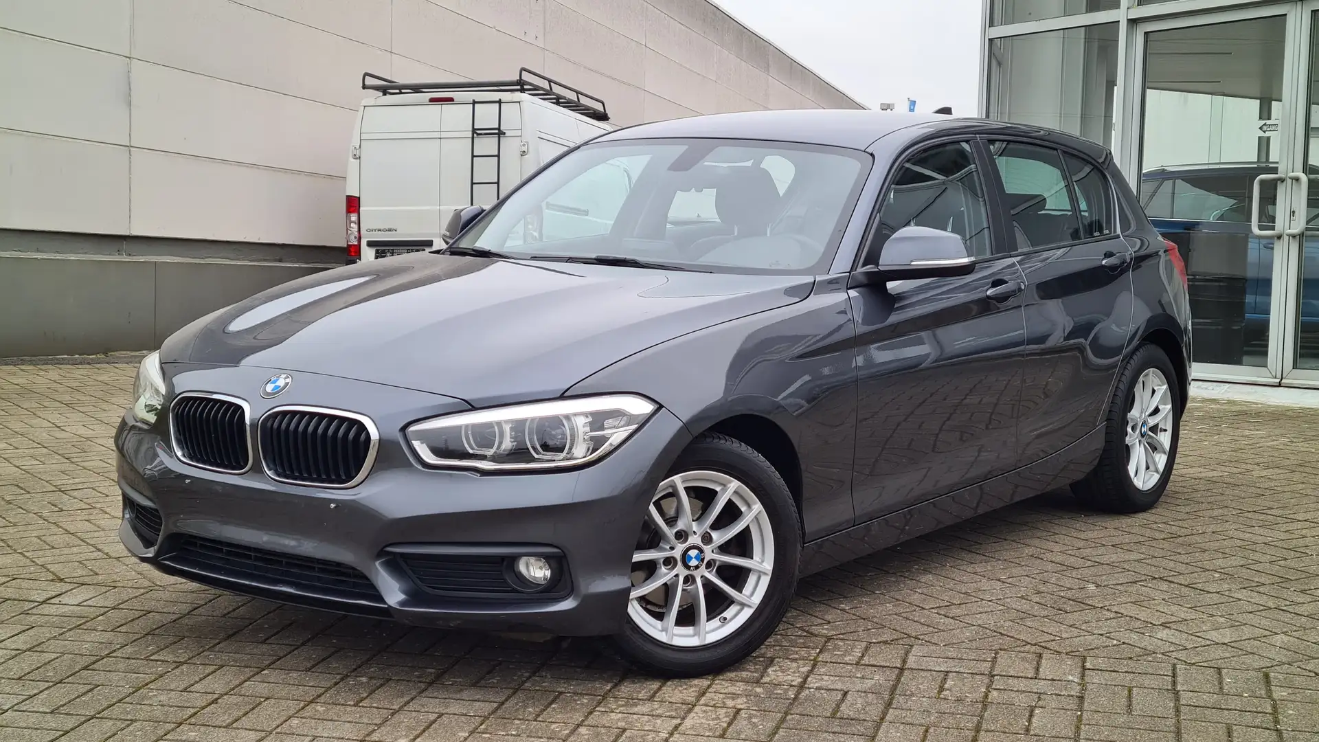 BMW 118 i 1.6i Benzine 100Kw Automatique Euro 6b Grigio - 1