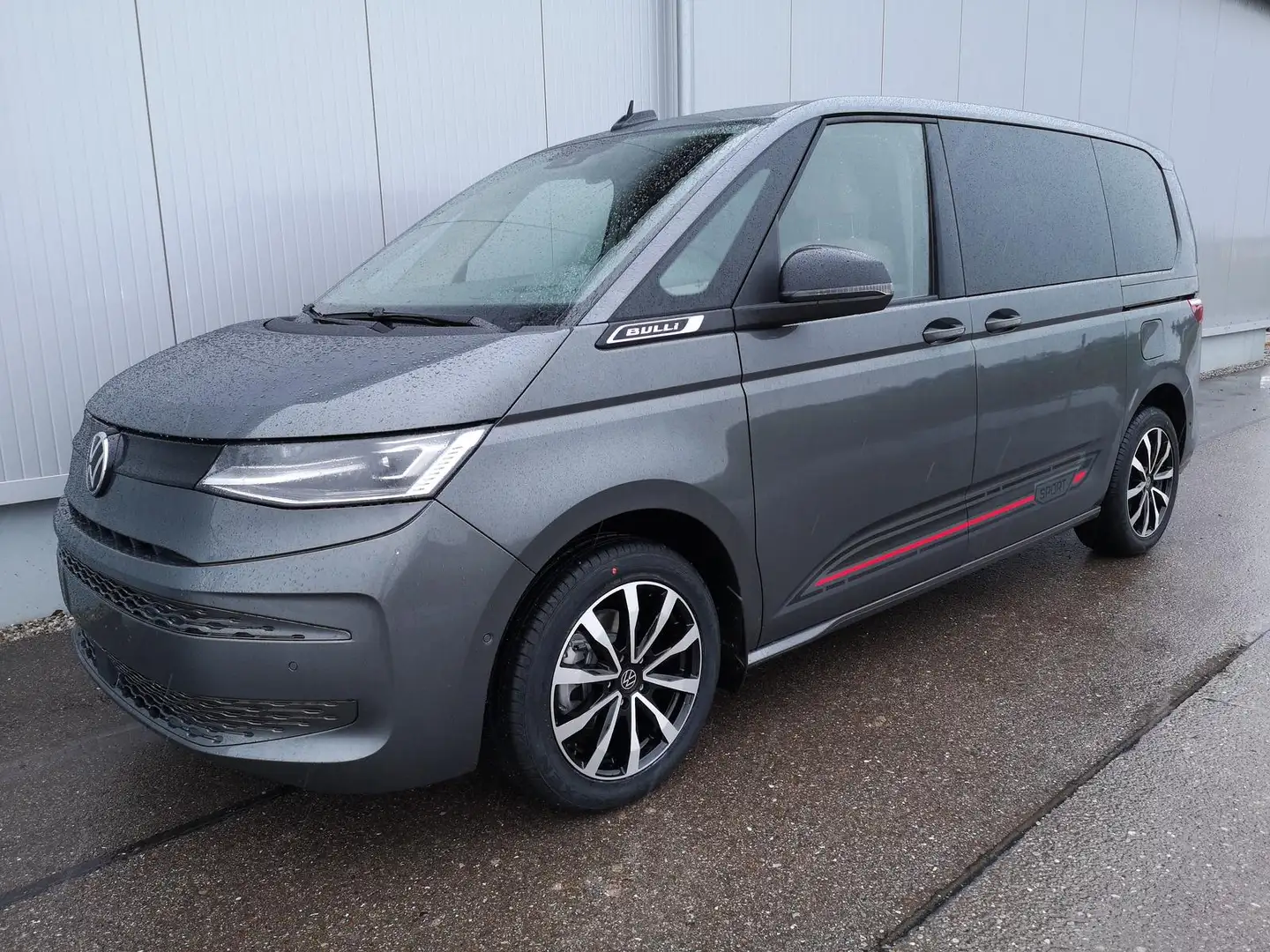 Volkswagen T7 Multivan 2.0 TDI KÜ DSG Navi Standh. Sport Edition Pano Tra Grau - 1
