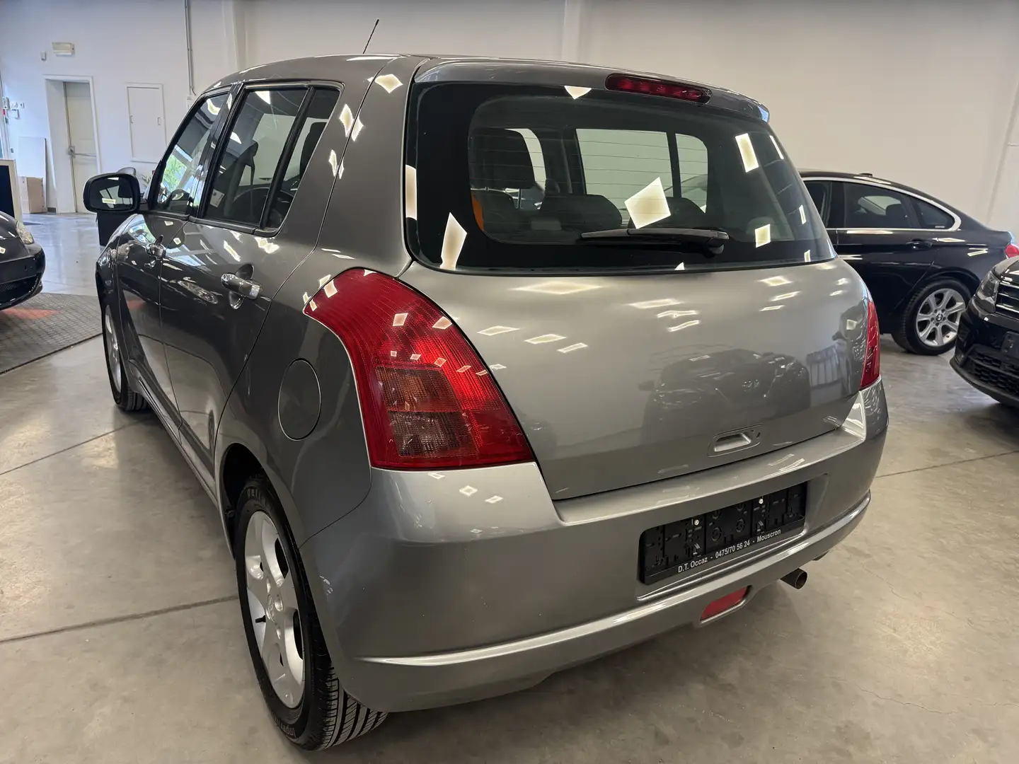 Suzuki Swift 1.3i GLX  X.tension Grijs - 2